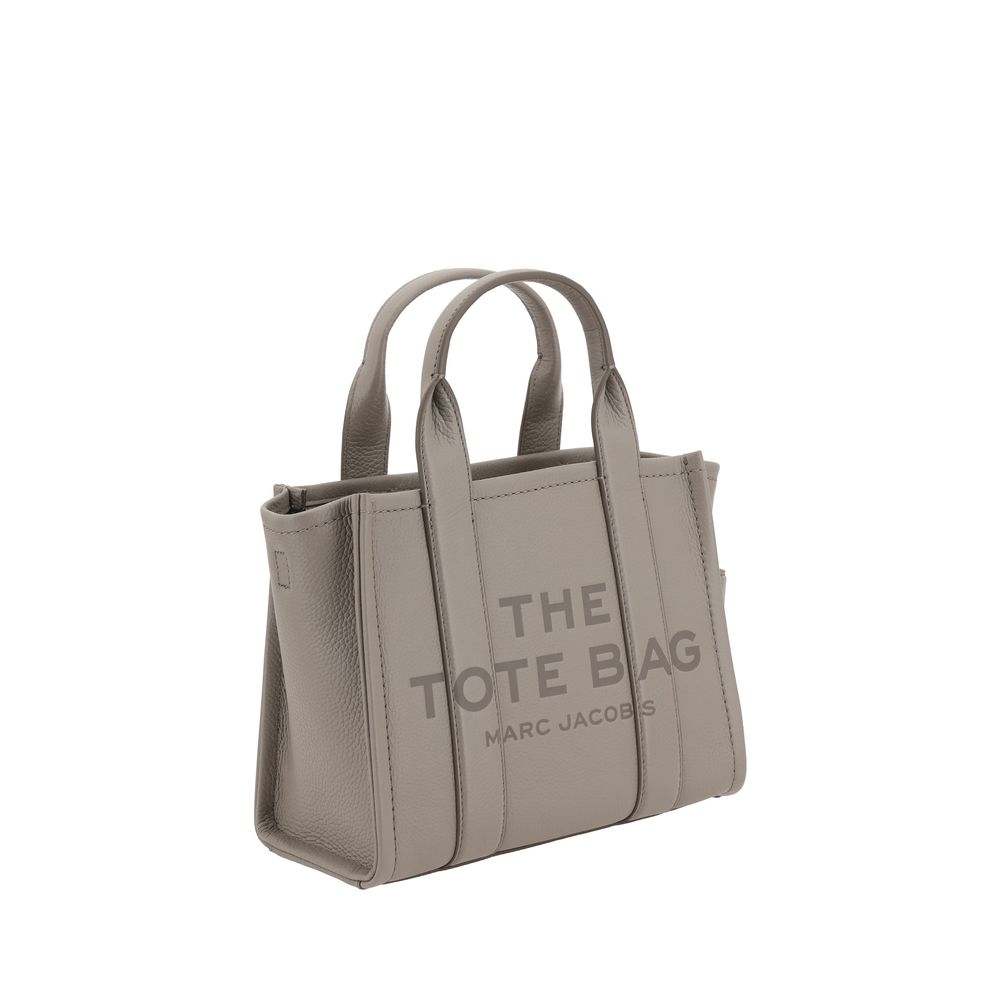 Discover the Marc Jacobs Gray Calf Leather Bos Taurus Handbag, a symbol of refined elegance and timeless luxury, perfect for the discerning individual.