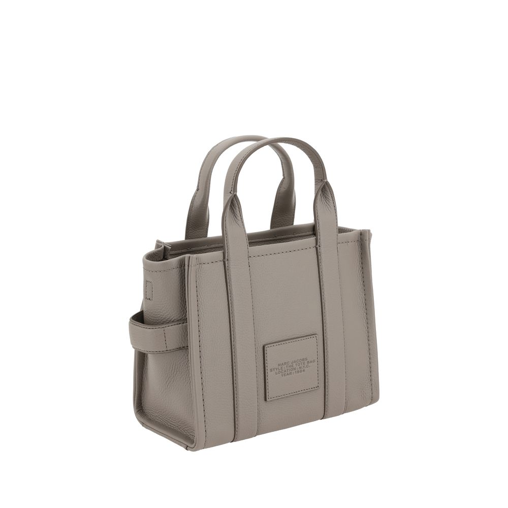 Discover the Marc Jacobs Gray Calf Leather Bos Taurus Handbag, a symbol of sophistication and elegance, crafted for those who embrace luxury and timeless style.