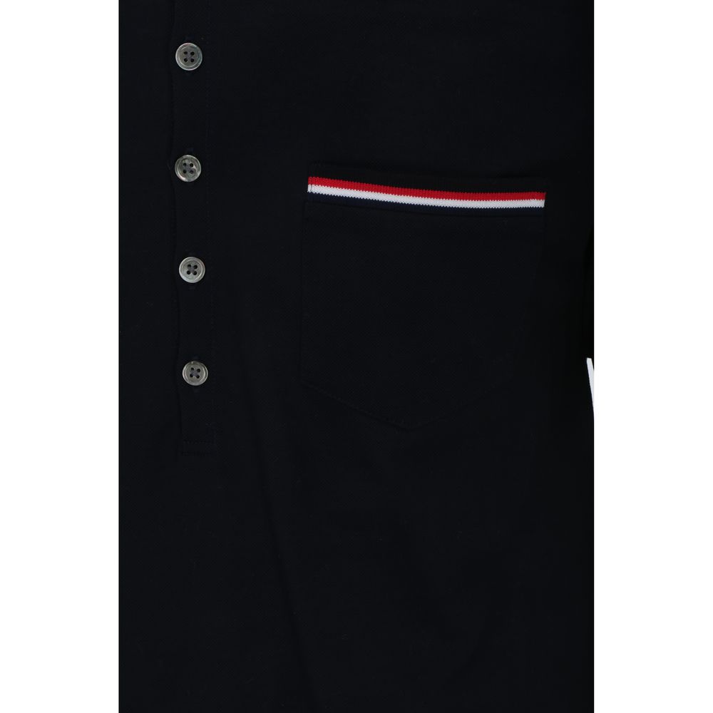Experience the Thom Browne Blue Cotton Polo Shirt from the SS26 collection, a masterpiece of 100% cotton that redefines luxury with its elegant design and sophisticated details.
