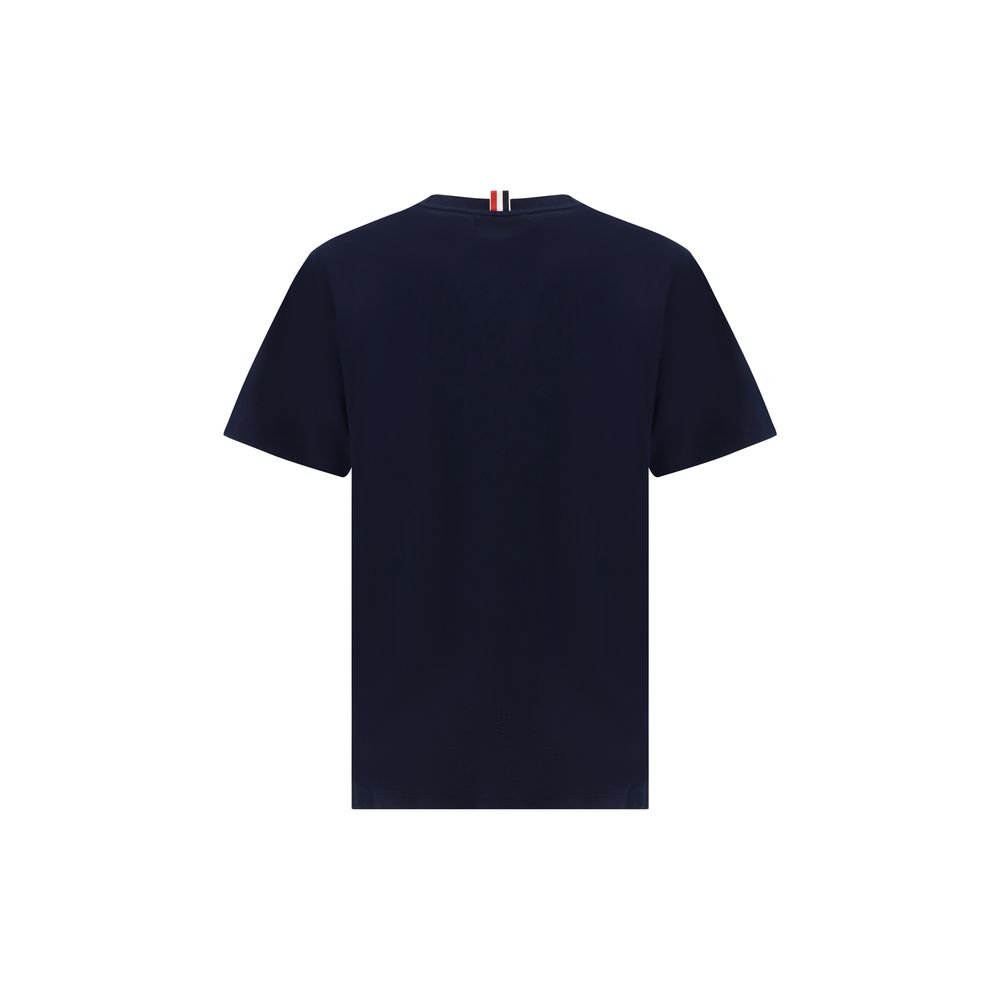 Discover the Thom Browne Blue Cotton T-Shirt, a symbol of luxury crafted from 100% cotton, designed for effortless elegance and timeless sophistication.