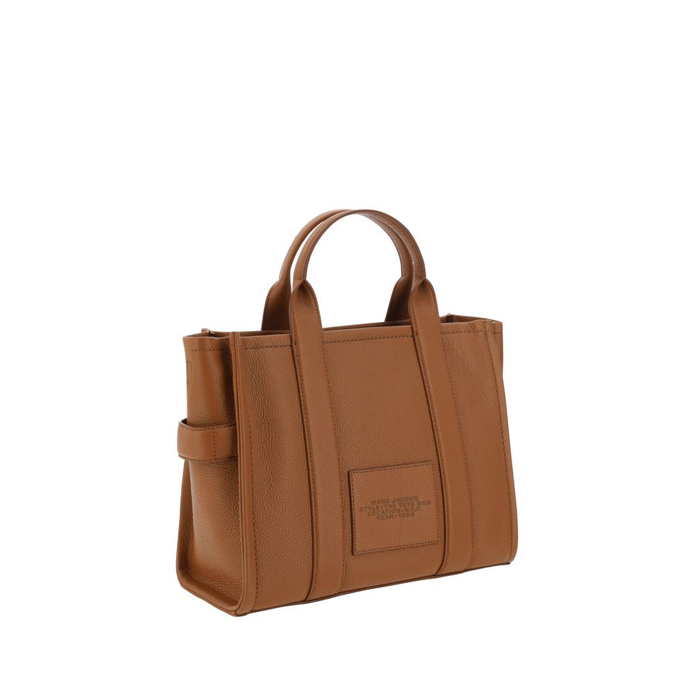 Discover the Marc Jacobs Brown Calf Leather Bos Taurus Handbag, a symbol of artisanal luxury and timeless elegance, crafted for the discerning individual.