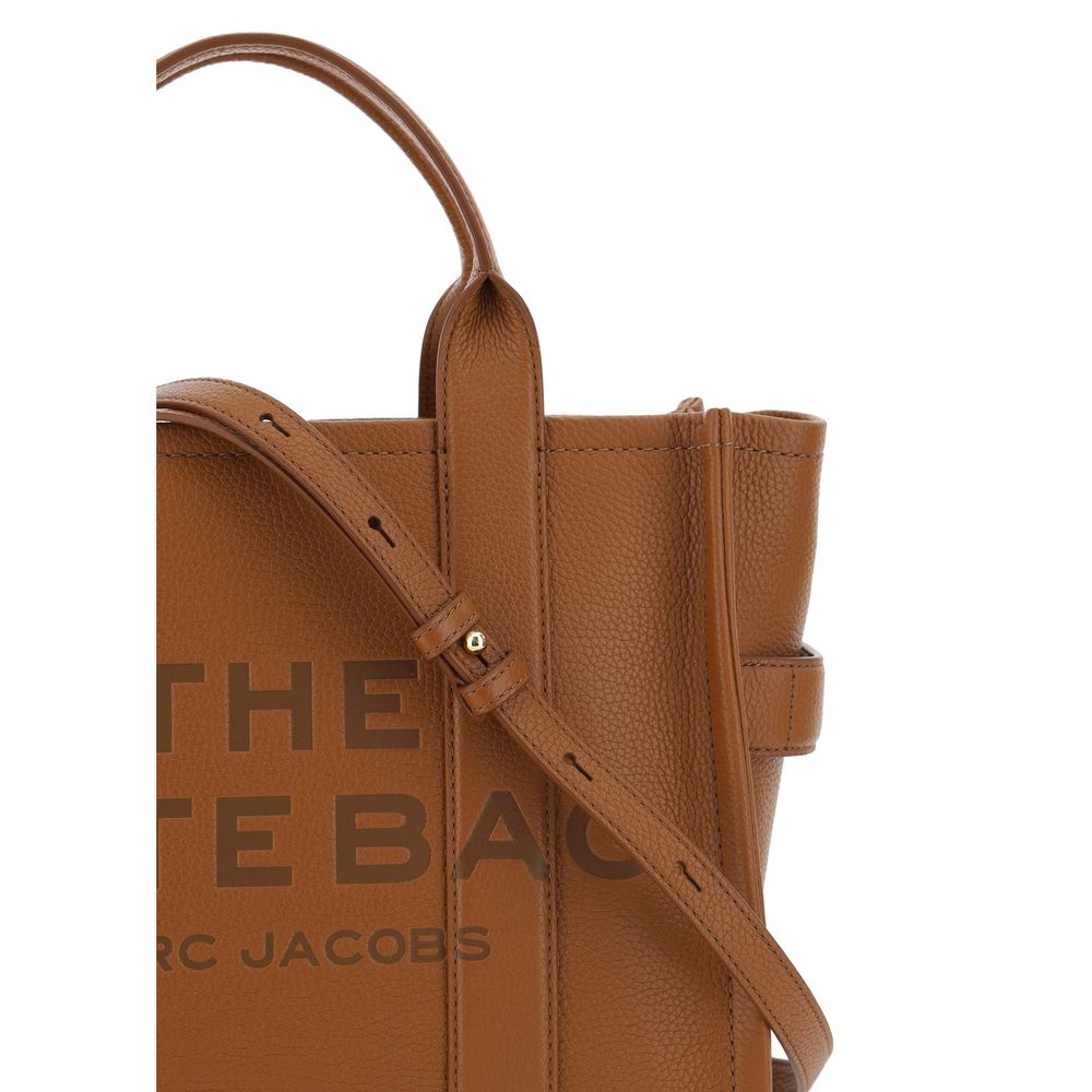Experience the exquisite artistry of the Marc Jacobs Brown Calf Leather Bos Taurus Handbag, a timeless symbol of luxury and sophistication for the discerning individual.