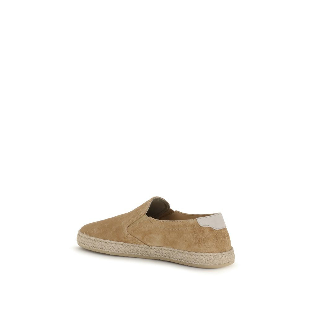 Indulge in the exquisite craftsmanship of Brunello Cucinelli's Beige Calf Leather Bos Taurus Espadrilles, where luxurious materials meet effortless elegance, perfect for any discerning wardrobe.