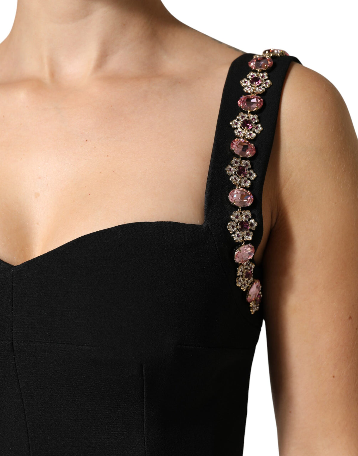 Discover the Dolce & Gabbana Black Embellished Sheath Mermaid Gown, a testament to Italian craftsmanship, exuding elegance and sophistication for unforgettable moments.