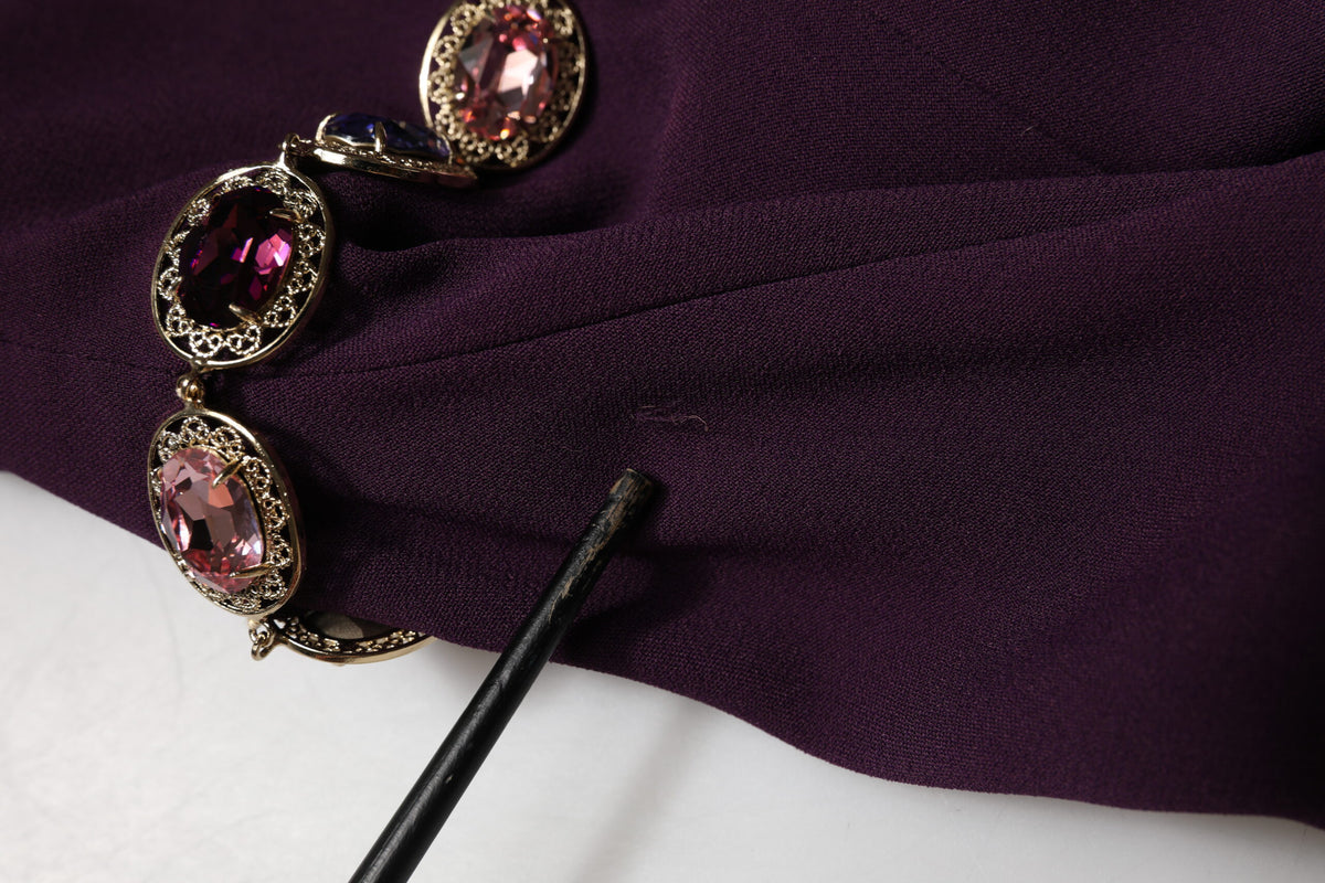 Elevate your elegance with the Dolce & Gabbana Violet Embellished Sheath Mermaid Gown, a masterpiece of Italian craftsmanship designed for unforgettable moments.