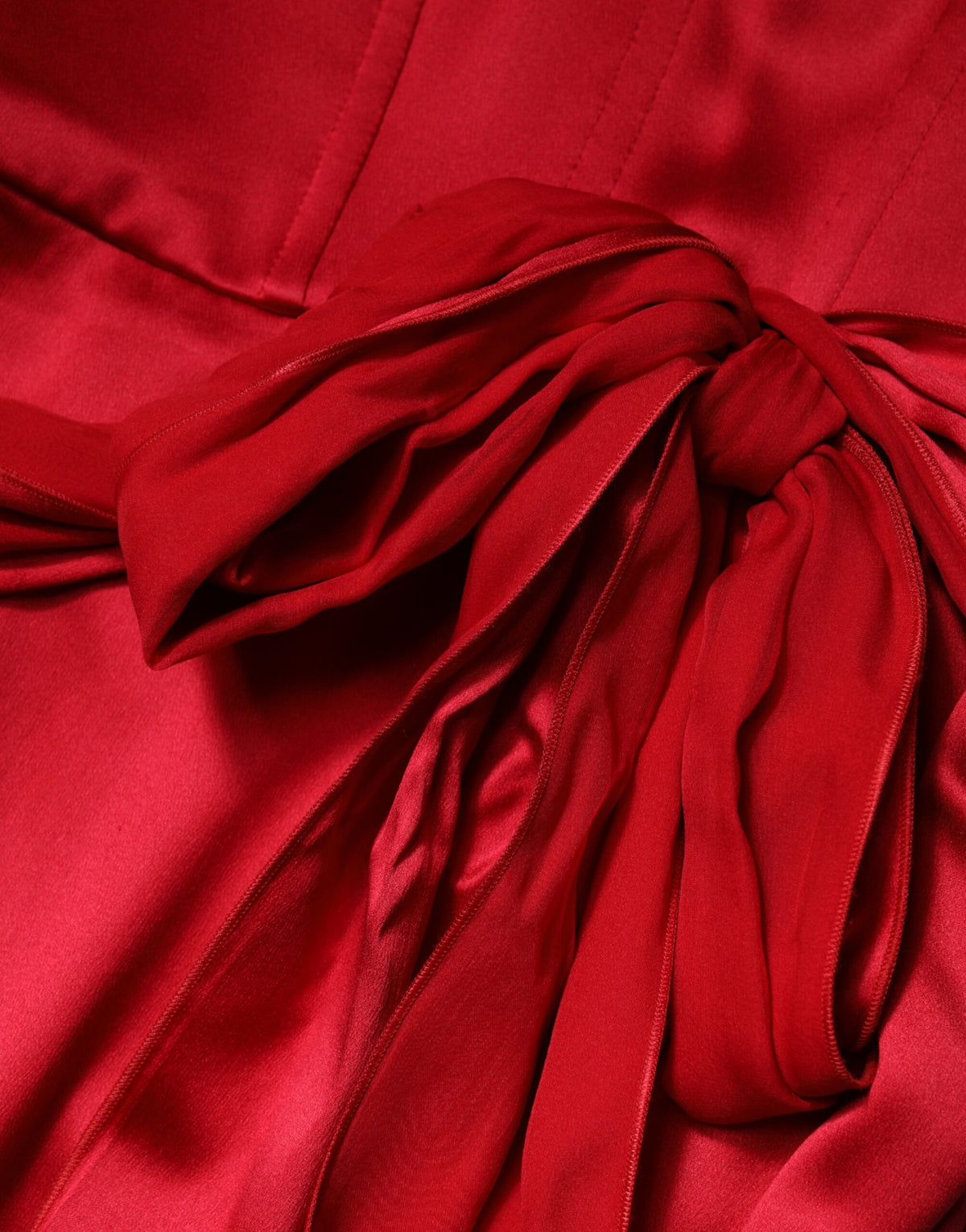 Indulge in the allure of the Dolce & Gabbana Red Silk Strapless Sheath Gown, a masterpiece of Italian craftsmanship that embodies timeless elegance and sophistication.