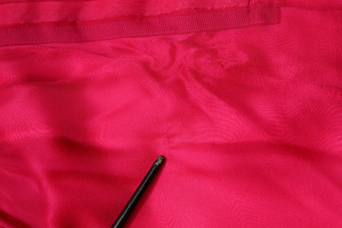 Experience the allure of the Dolce & Gabbana Pink Silk Embellished A-line Midi Dress, a masterpiece of Italian craftsmanship that embodies timeless elegance and refined luxury.