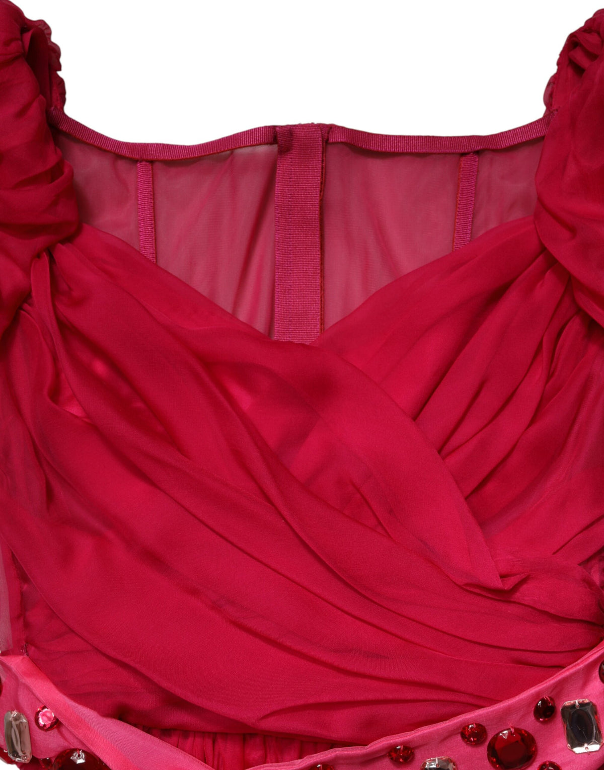 Indulge in the exquisite allure of the Dolce & Gabbana Pink Silk Embellished A-line Midi Dress, a masterpiece of Italian craftsmanship that embodies refined luxury and timeless elegance.