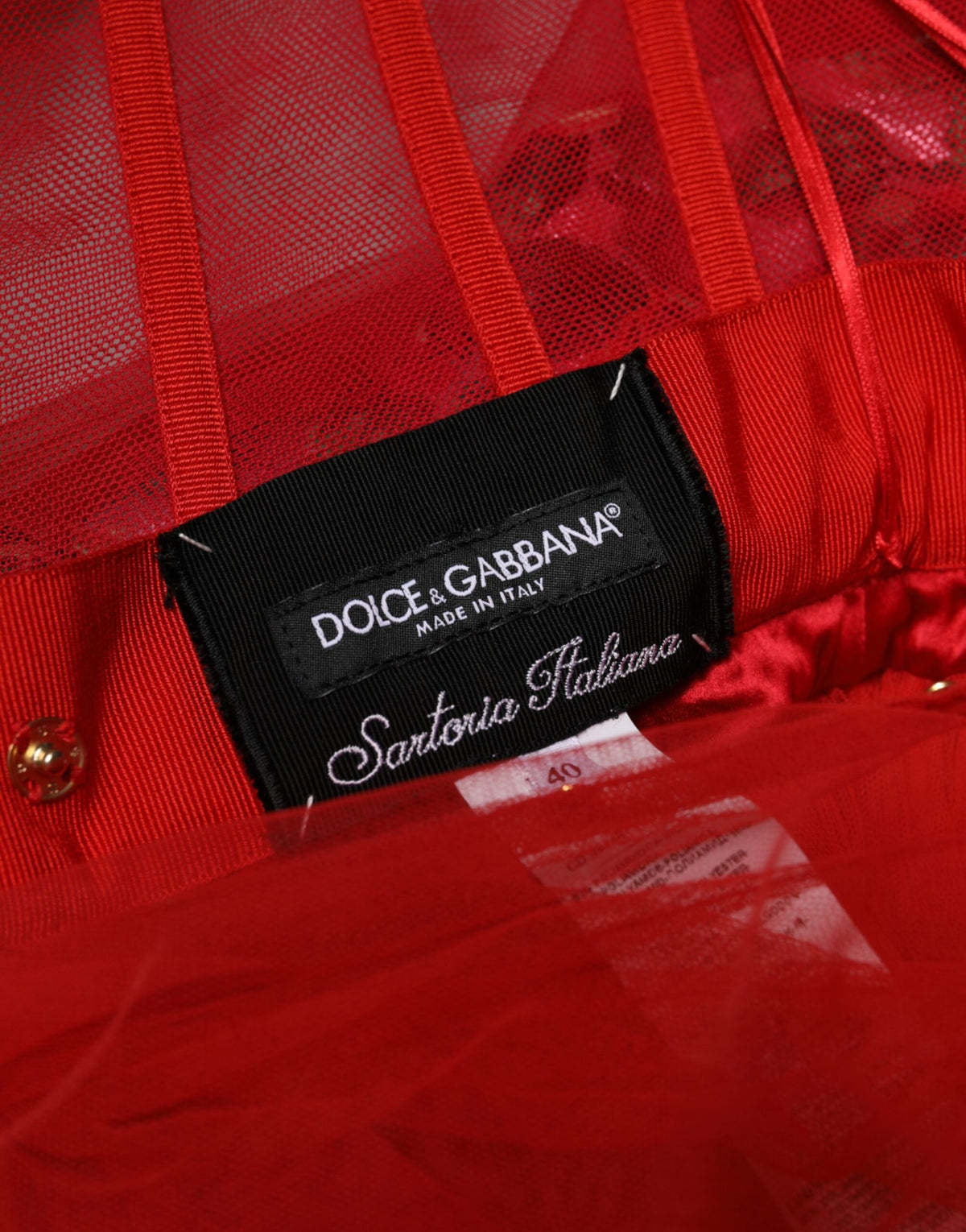 Indulge in the exquisite allure of the Dolce & Gabbana Red Floral Off Shoulder A-line Gown, crafted with luxurious materials for timeless elegance and captivating presence.