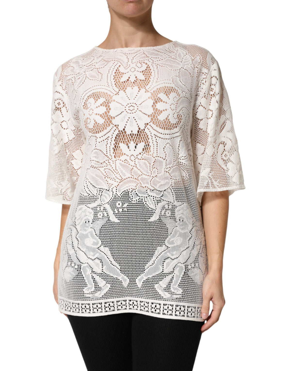 Elevate your wardrobe with the Dolce & Gabbana White Embroidery Lace Cotton Blouse Top, a masterpiece of Italian craftsmanship that embodies timeless elegance and refined femininity.