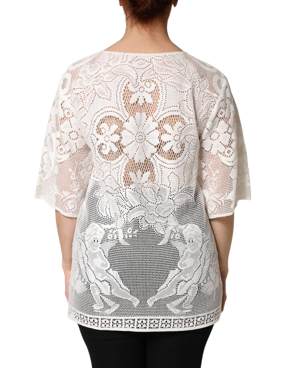 Indulge in the exquisite craftsmanship of the Dolce & Gabbana White Embroidery Lace Cotton Blouse Top, a timeless piece that embodies refined femininity and luxurious sophistication.