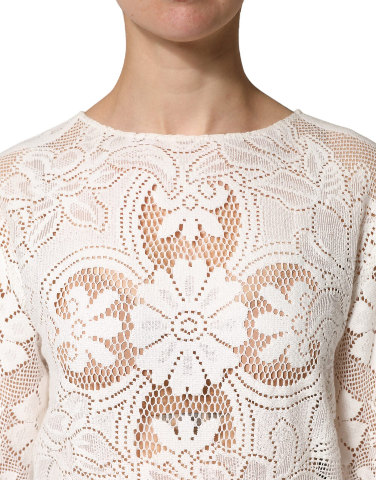 Indulge in the exquisite Dolce & Gabbana White Embroidery Lace Cotton Blouse Top, a timeless piece crafted from luxurious materials, embodying refined femininity and Italian artistry.