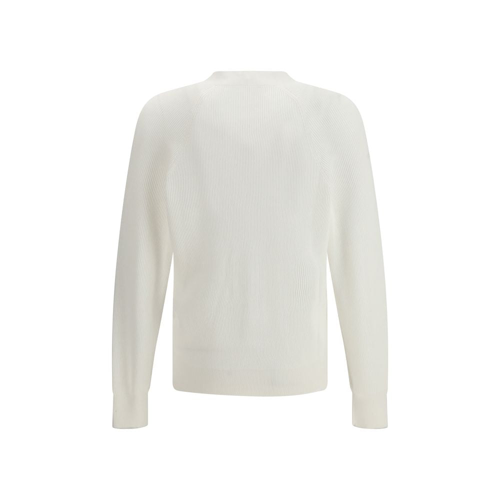 Indulge in the exquisite luxury of the Brunello Cucinelli White Cotton Cardigan, a timeless piece crafted from 100% cotton, perfect for elevating any sophisticated wardrobe.