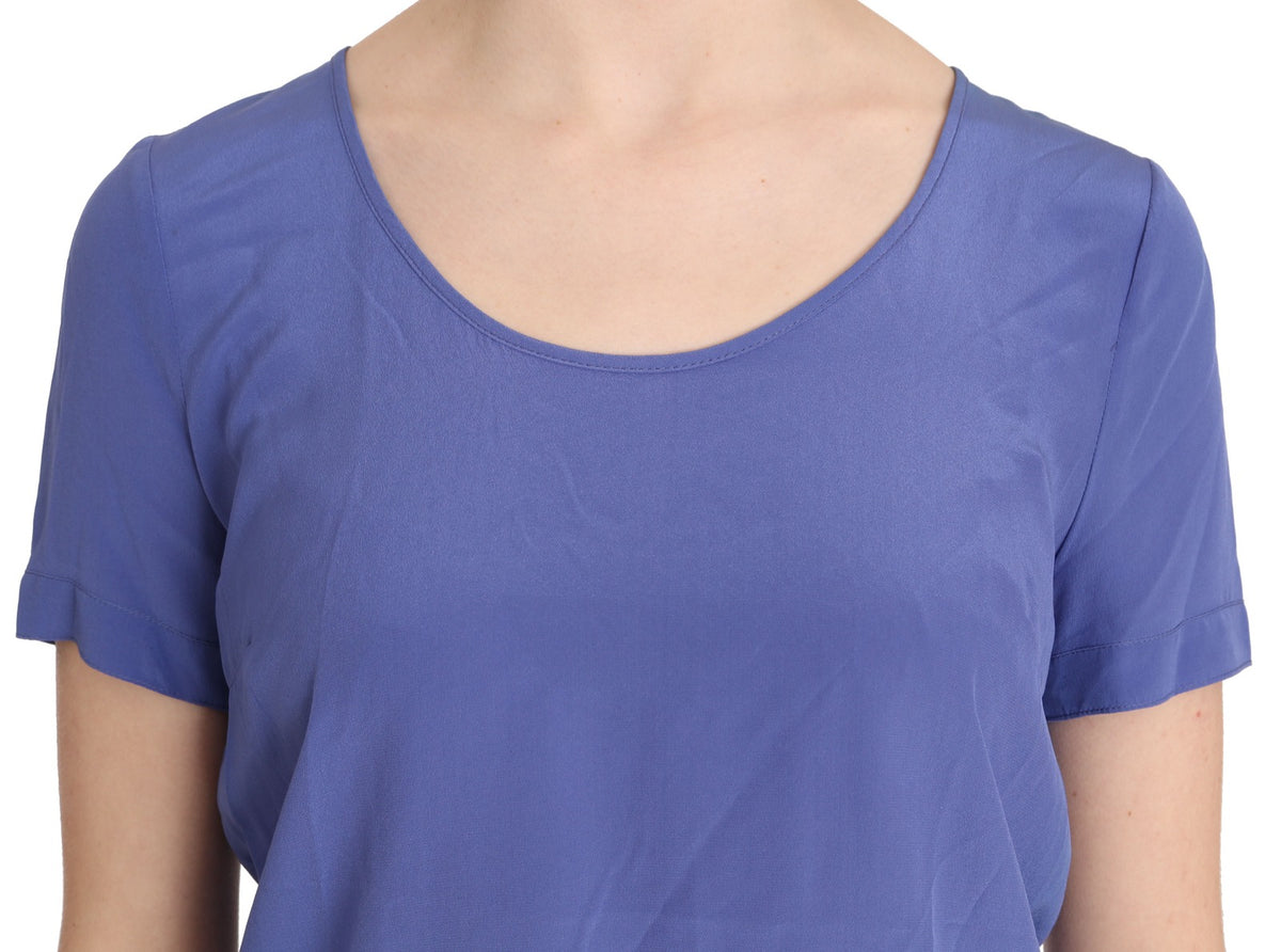 Elevate your wardrobe with the Patrizia Pepe Silk Purple Short Sleeve Blouse, a masterpiece of 100% silk that embodies elegance and timeless sophistication.