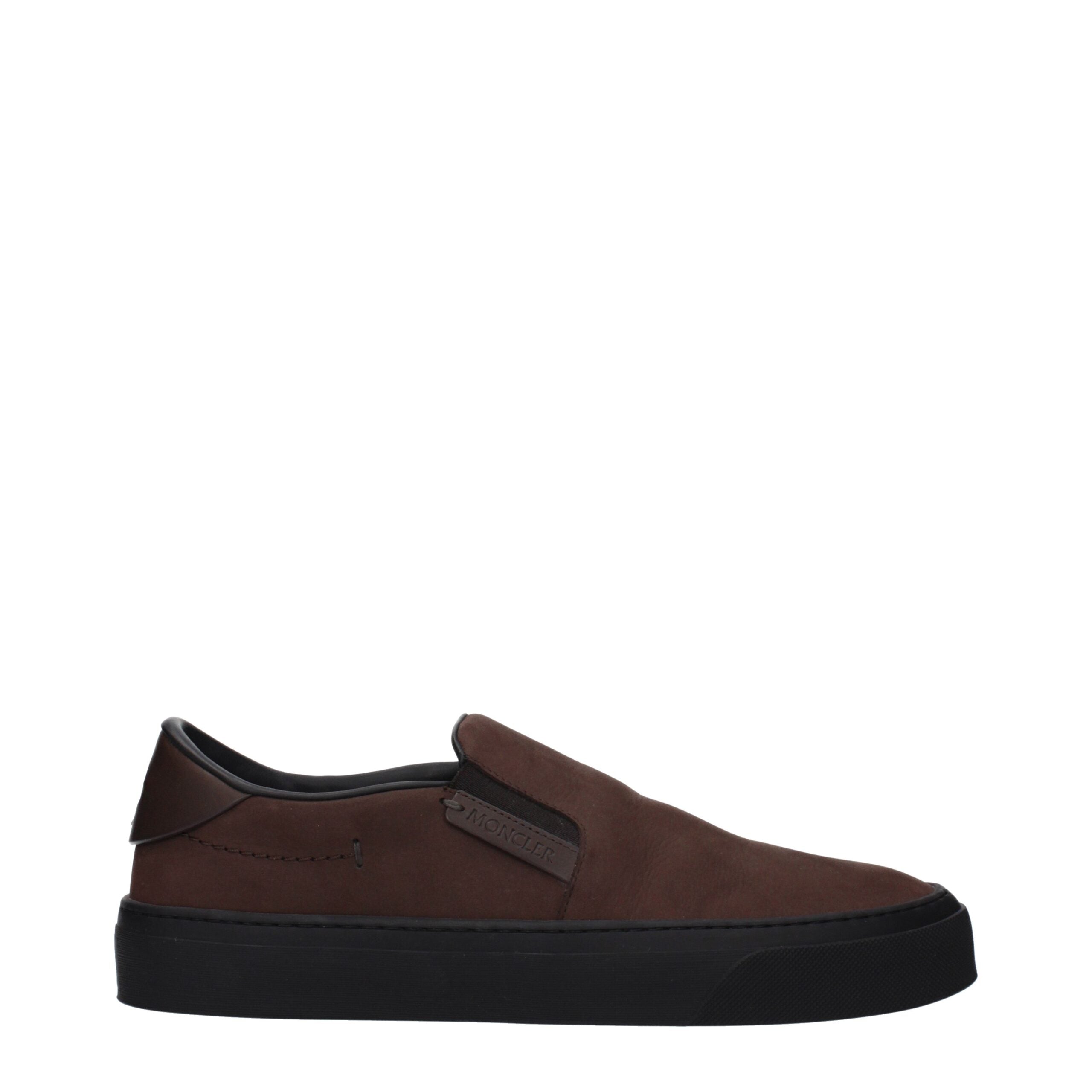 Experience the Moncler Brown Leather Slip-On Loafers, where exquisite craftsmanship meets timeless elegance, enveloping your feet in luxurious comfort for any occasion.