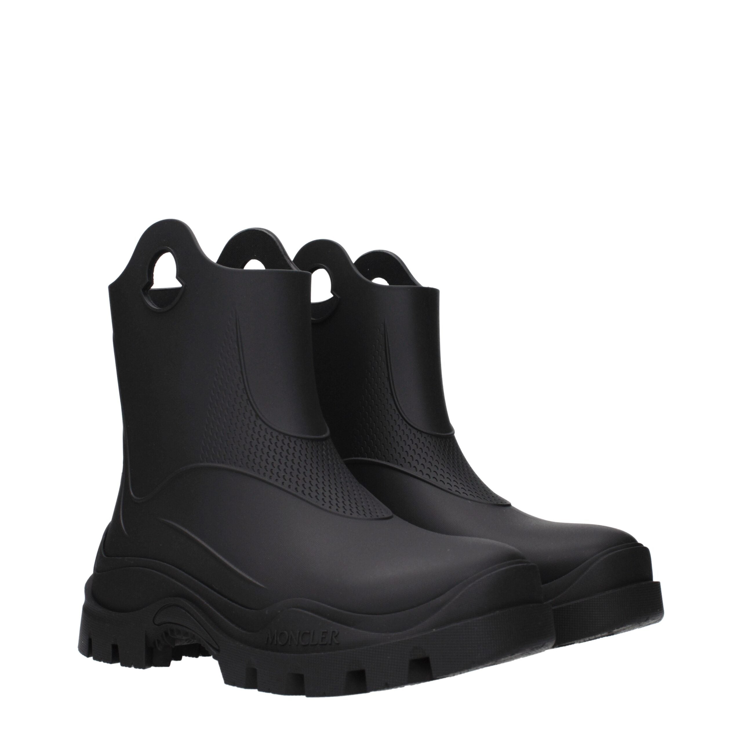 Elevate your style with Moncler Black Cotton Ankle Boots, a luxurious blend of high-quality craftsmanship and chic sophistication for the discerning individual.