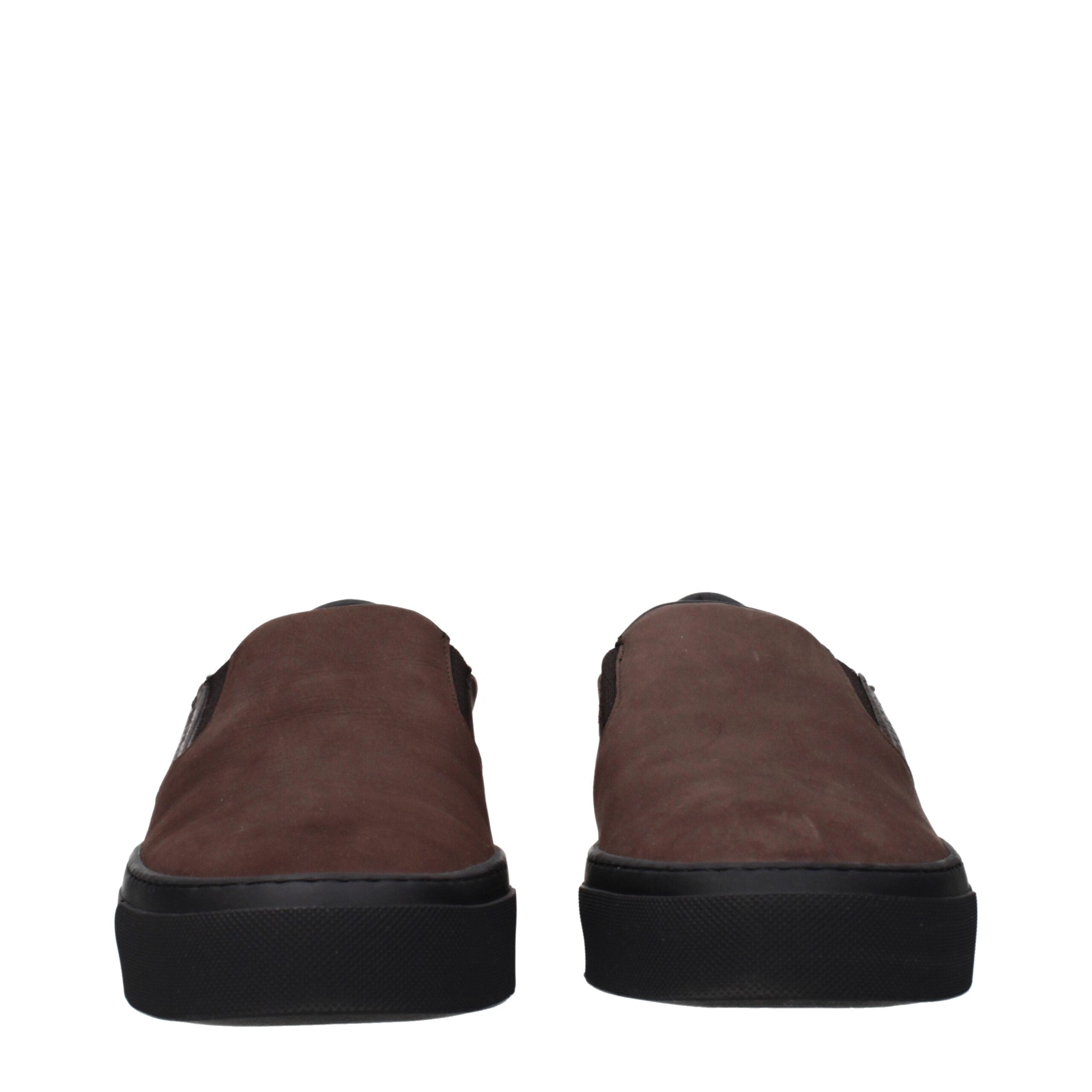 Experience the exquisite Moncler Brown Leather Slip-On Loafers, where artisanal craftsmanship meets timeless elegance, perfect for those who embody luxury and sophistication.