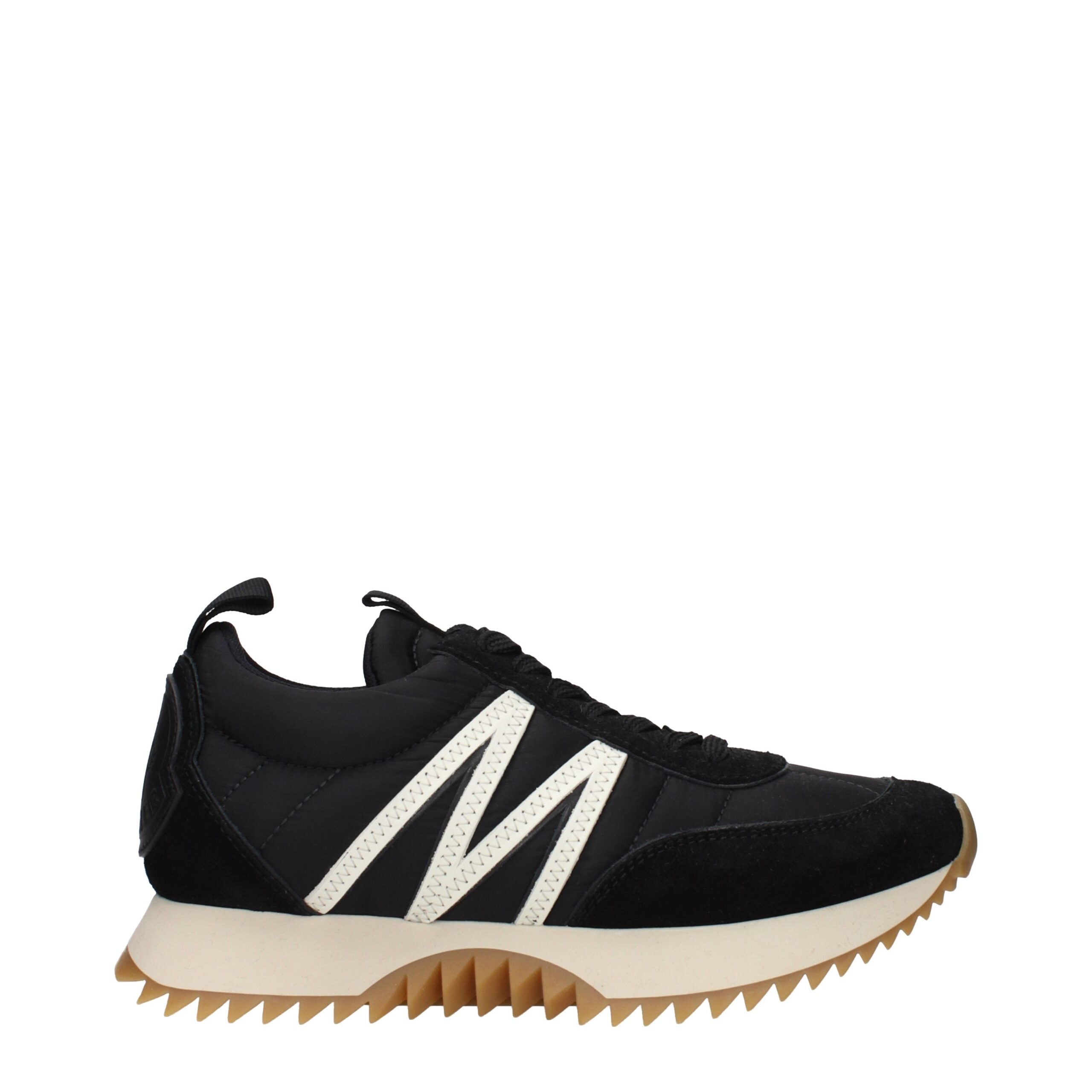 Step into elegance with Moncler Black Fabric Low Top Sneakers, where exquisite craftsmanship meets luxury, elevating your style for any occasion.
