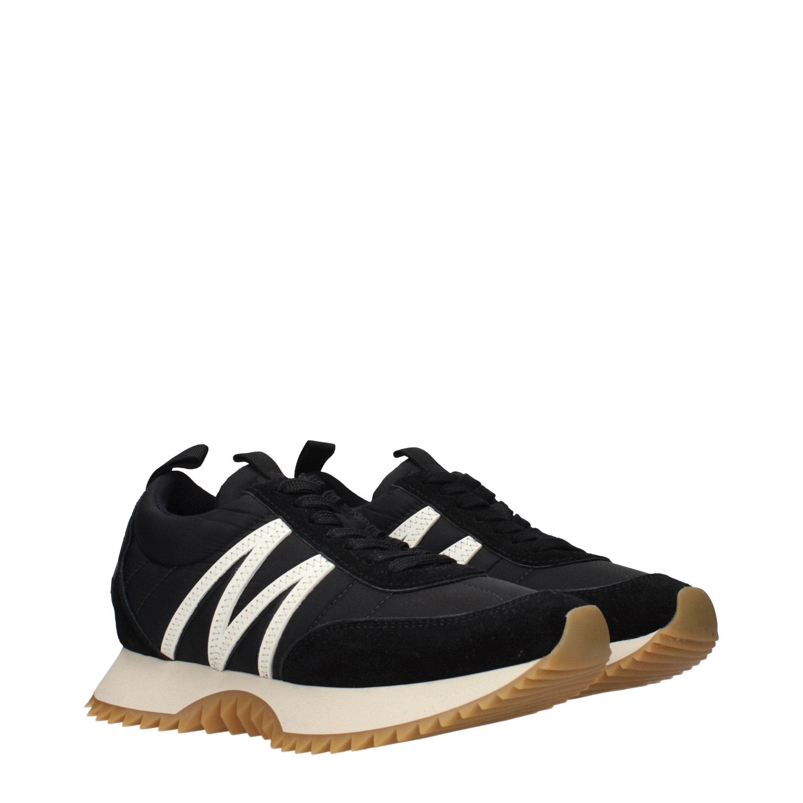 Experience the allure of Moncler Black Fabric Low Top Sneakers, where exquisite craftsmanship meets timeless elegance, perfect for elevating any sophisticated wardrobe.