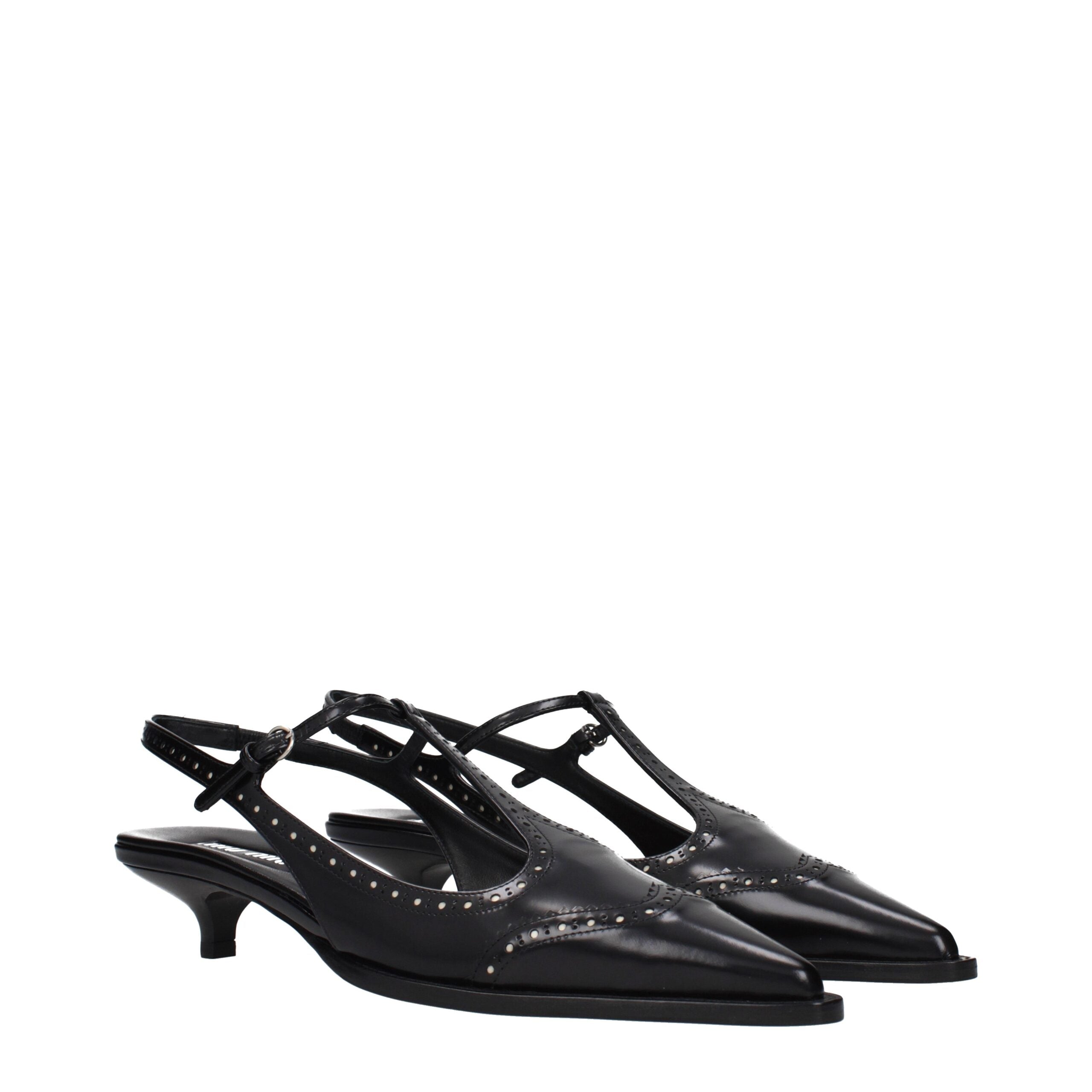 Experience the allure of Miu Miu Black Leather Mid Heel Pumps, where premium craftsmanship meets timeless elegance, perfect for the discerning individual.