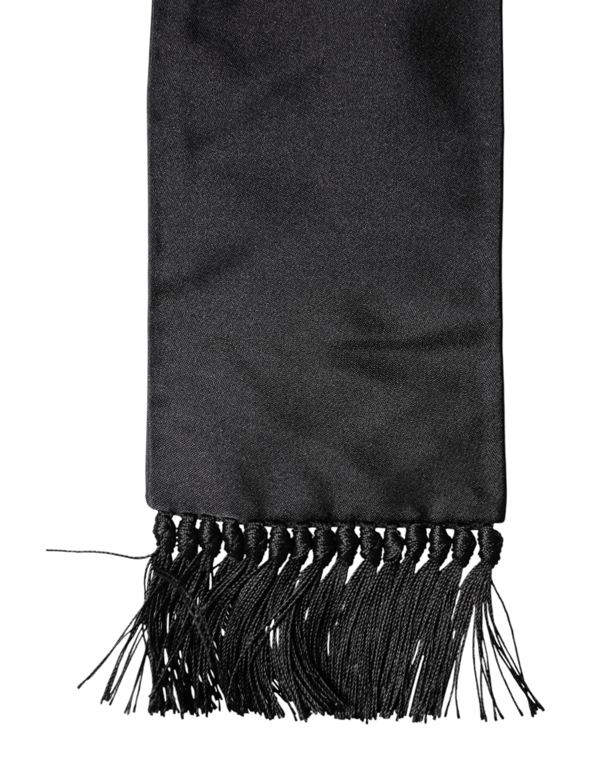 Elevate your style with the Dolce & Gabbana Black Silk Fringes Neck Wrap, a masterpiece of Italian craftsmanship that embodies timeless luxury and modern artistry.