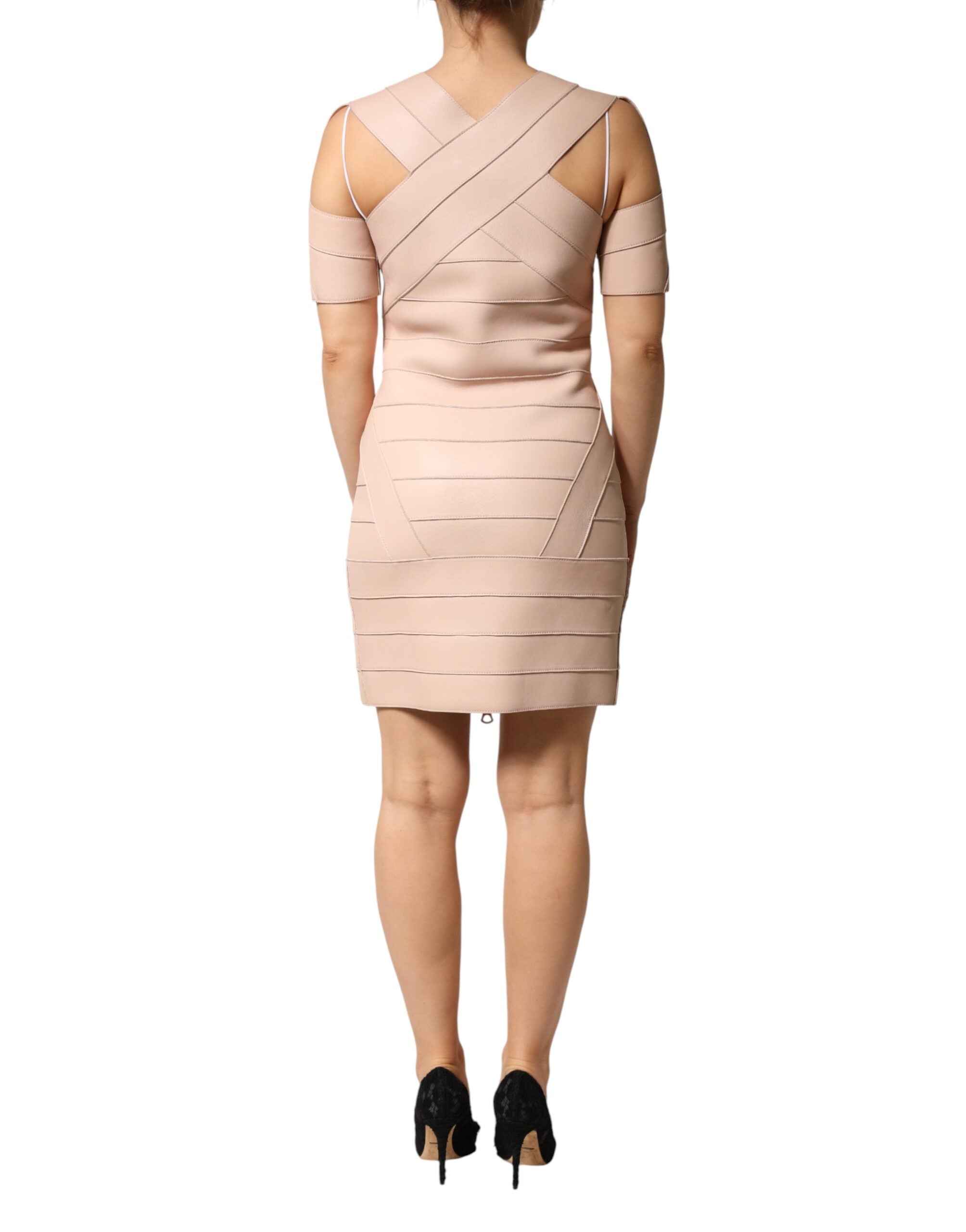 Indulge in the exquisite Dsquared² Beige Leather Short Sleeves Sheath Mini Dress, a masterpiece of Italian craftsmanship that embodies timeless elegance and refined allure.