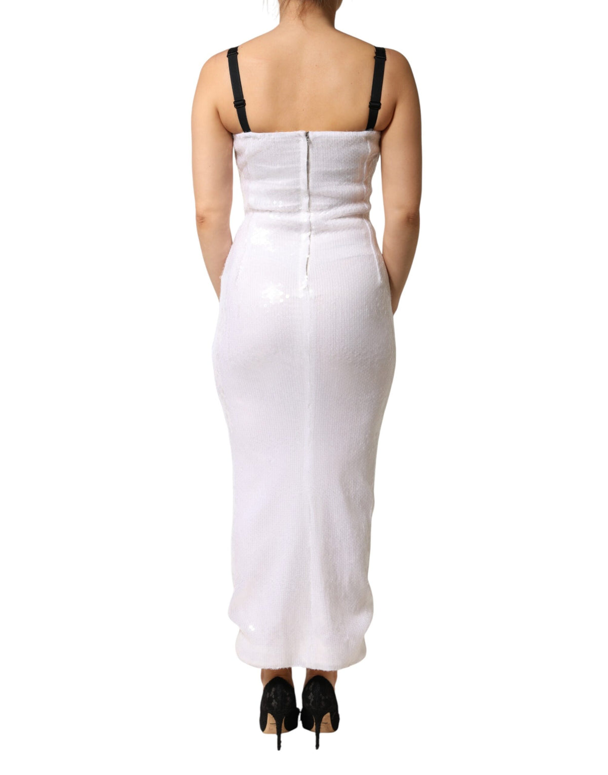 Discover the Dolce & Gabbana White Polyester Sleeveless Sheath Dress, a timeless piece of Italian craftsmanship that embodies elegance and sophistication for any occasion.