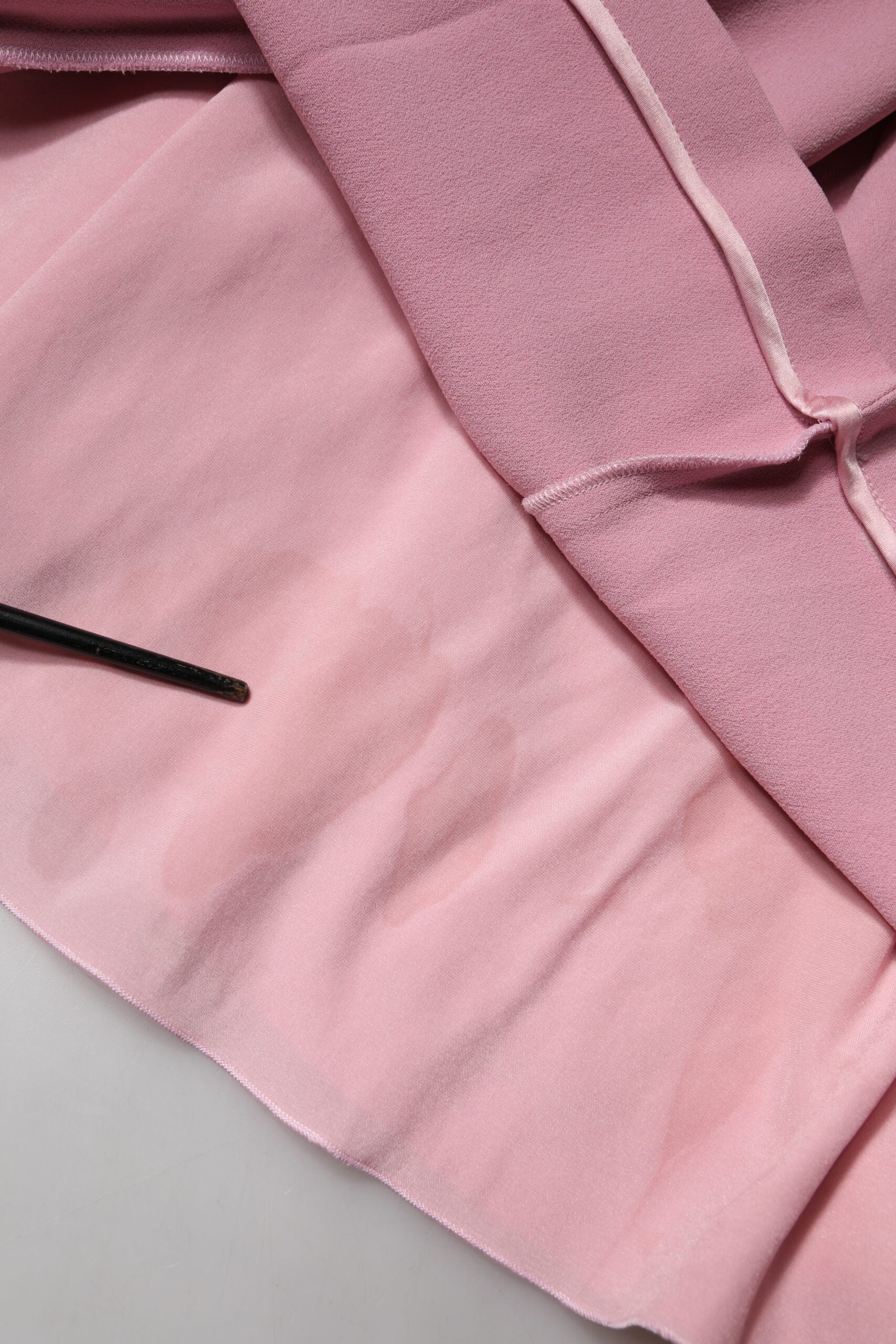 Discover the allure of the Dolce & Gabbana Pink Viscose Sleeveless Sheath Midi Dress, a masterpiece of Italian craftsmanship that embodies elegance and sophistication for every occasion.