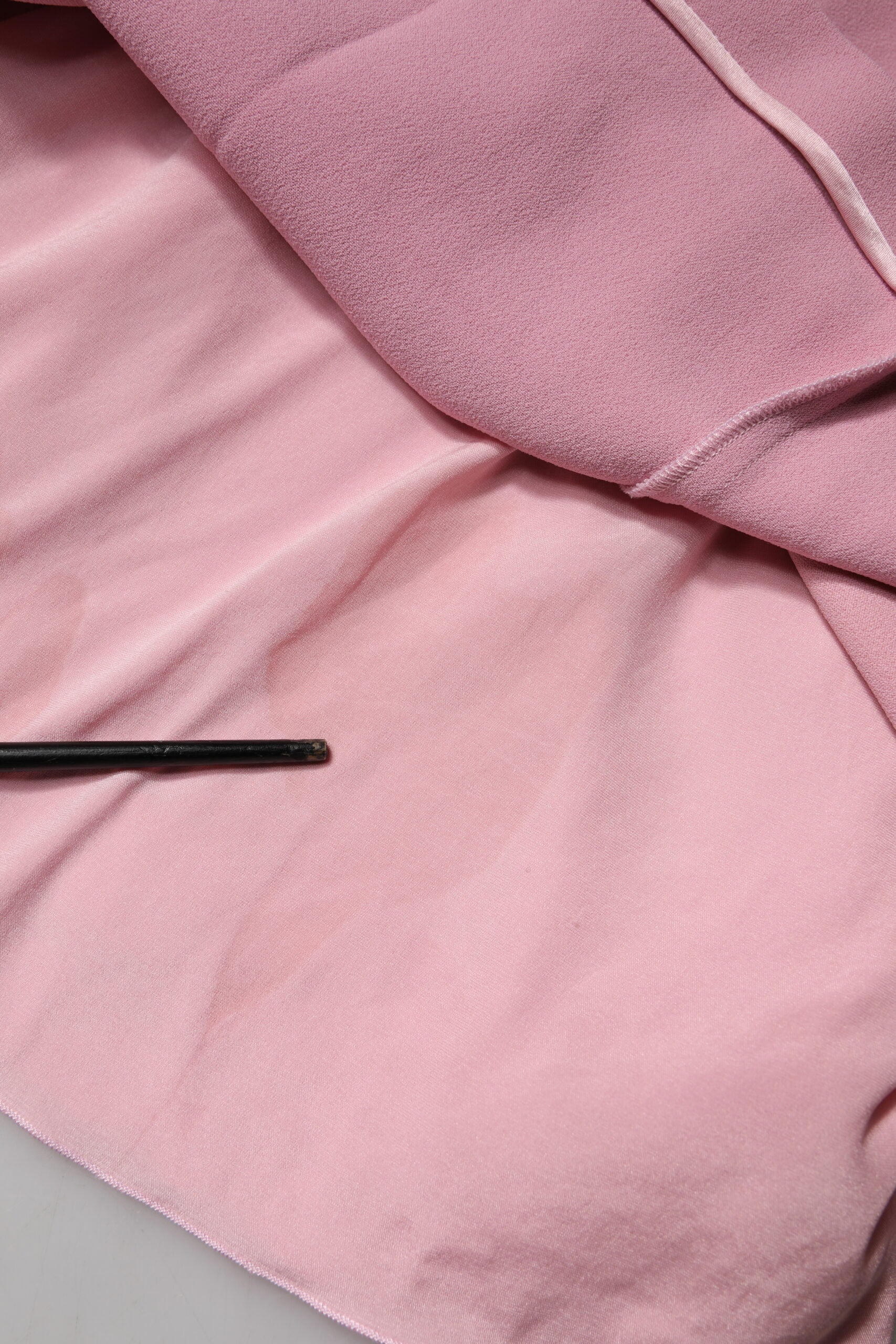 Experience the allure of the Dolce & Gabbana Pink Viscose Sleeveless Sheath Midi Dress, a masterpiece of Italian craftsmanship that embodies elegance and sophistication for every occasion.