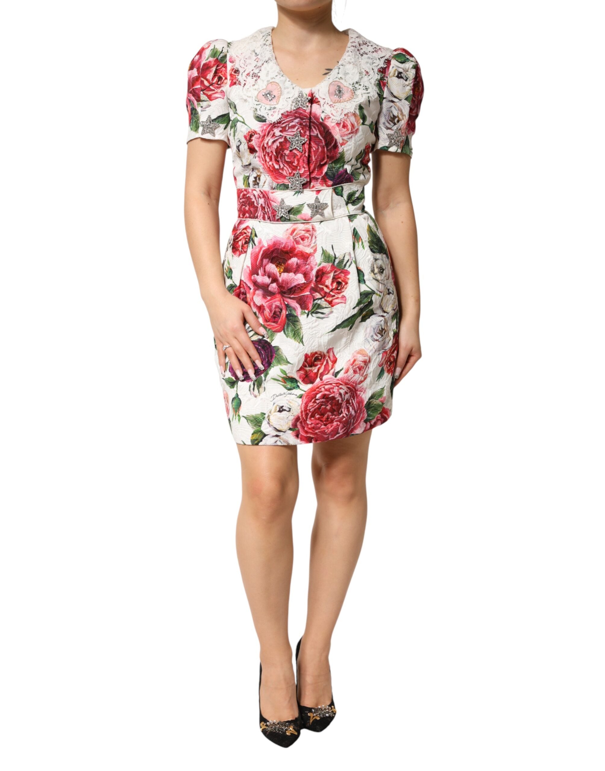 Indulge in the exquisite Dolce & Gabbana White Floral Embellished Sheath Mini Dress, a masterpiece of Italian craftsmanship that embodies luxury and sophistication for the discerning individual.