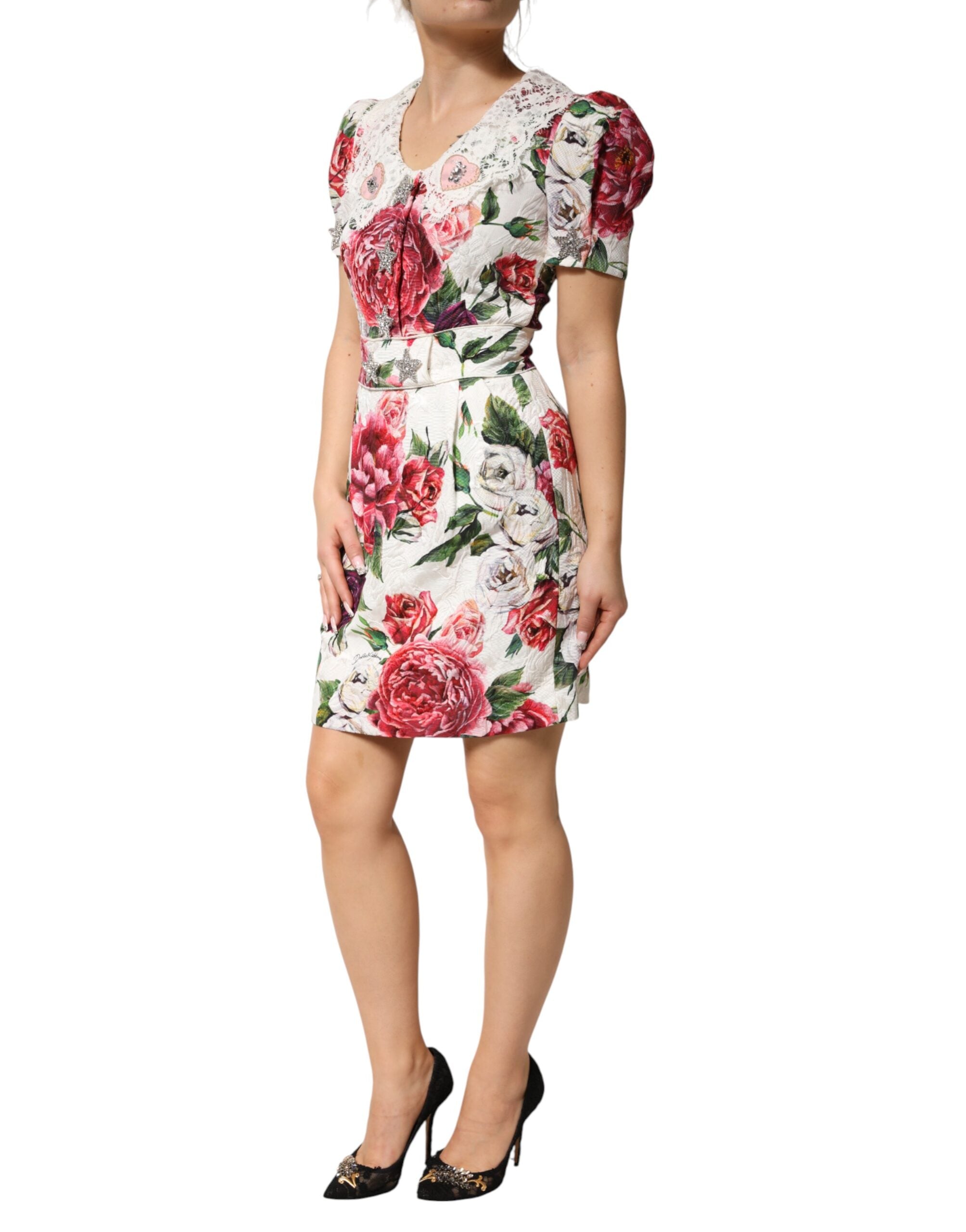 Elevate your wardrobe with the Dolce & Gabbana White Floral Embellished Sheath Mini Dress, a masterpiece of Italian craftsmanship and luxurious materials, perfect for any sophisticated occasion.