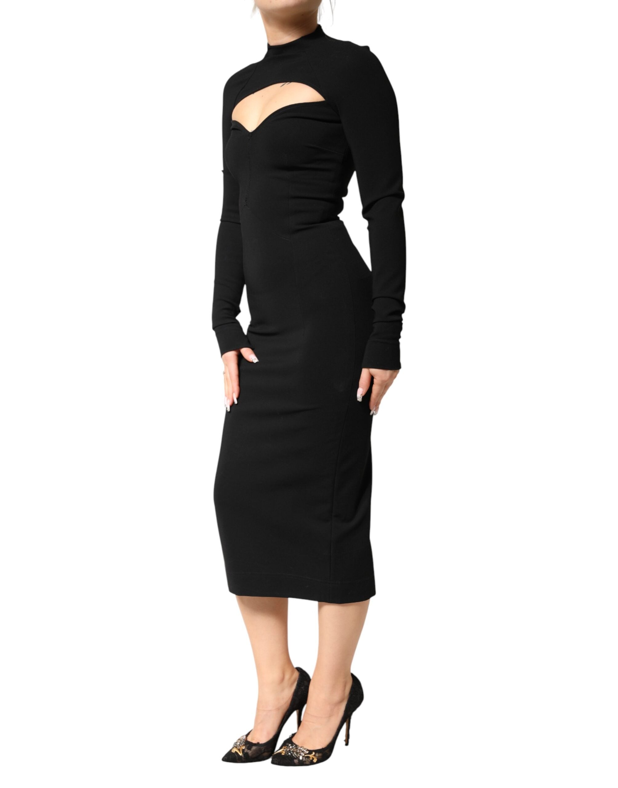 Indulge in the exquisite Dolce & Gabbana Black Viscose Bodycon Sheath Midi Dress, a masterpiece of Italian craftsmanship that embodies sensual elegance and timeless allure.