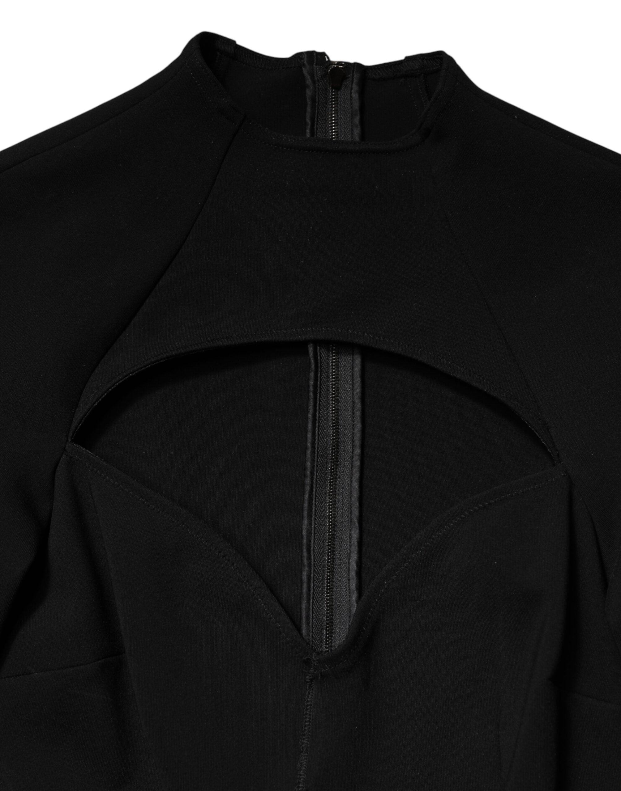 Experience the allure of the Dolce & Gabbana Black Viscose Bodycon Sheath Midi Dress, a testament to exquisite craftsmanship and timeless elegance, perfect for the discerning individual.
