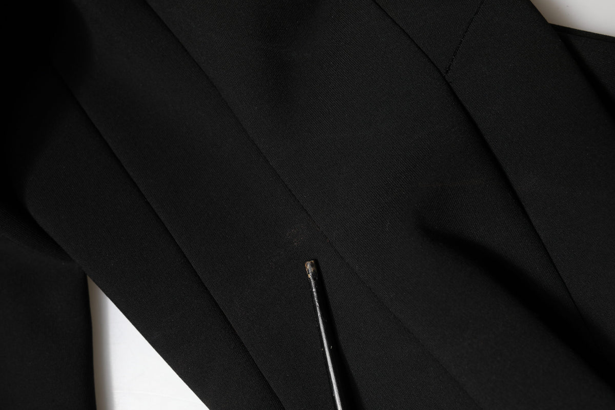 Experience the allure of the Dolce & Gabbana Black Viscose Bodycon Sheath Midi Dress, where exquisite craftsmanship meets sensual elegance, perfect for the discerning individual.