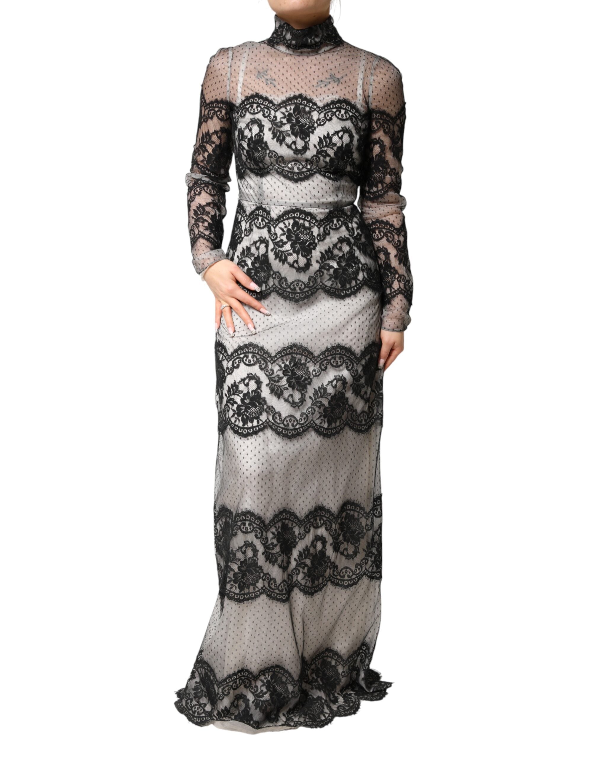 Elevate your elegance with the Dolce & Gabbana Black White Lace Silk Blend MaxiSheath Dress, a timeless masterpiece of Italian craftsmanship that captivates every occasion.