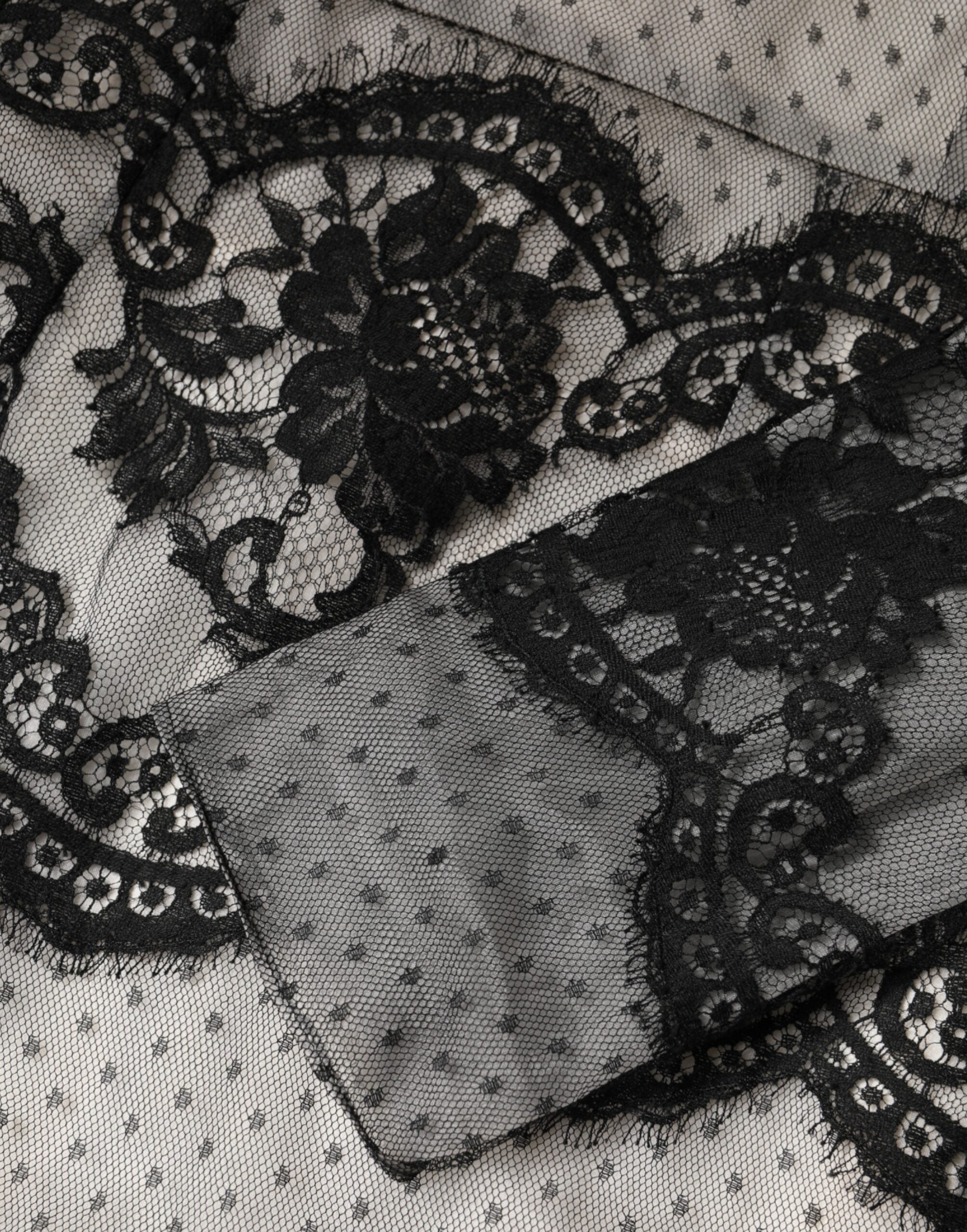 Indulge in the exquisite Dolce & Gabbana Black White Lace Silk Blend MaxiSheath Dress, a timeless masterpiece that embodies luxury and sophistication for any elegant occasion.
