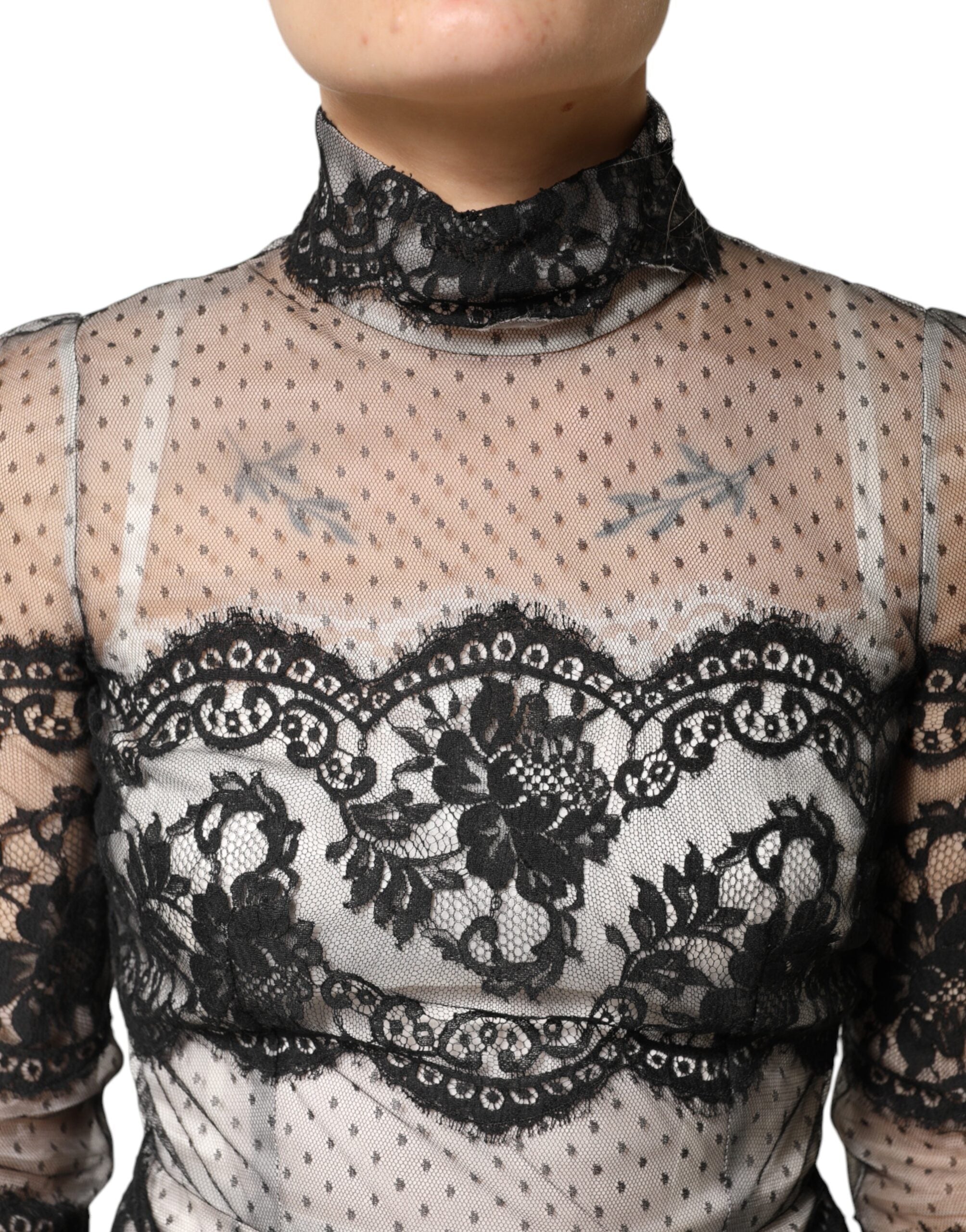 Indulge in the exquisite Dolce & Gabbana Black White Lace Silk Blend MaxiSheath Dress, where luxurious silk and intricate lace create a timeless silhouette for unforgettable moments.