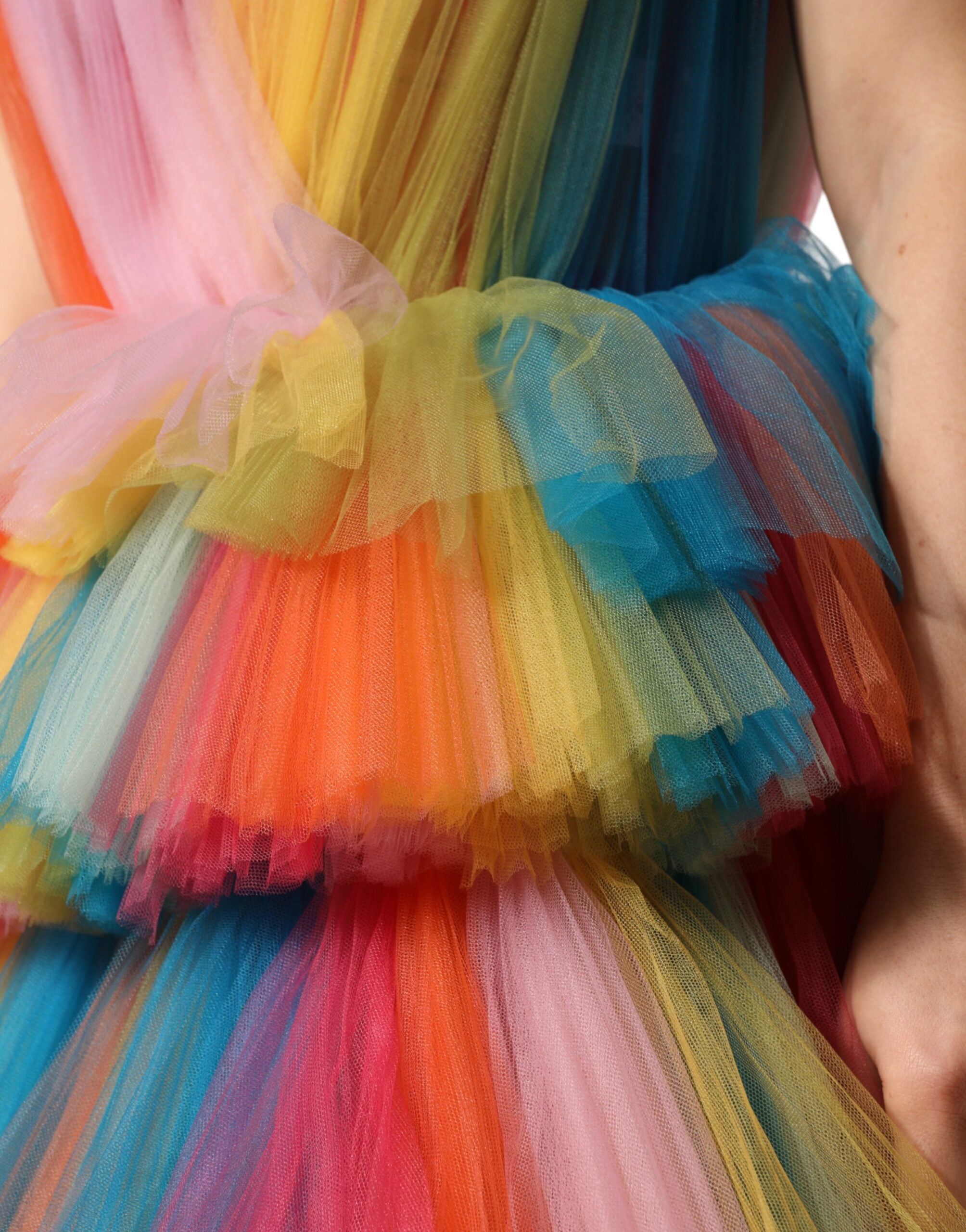 Indulge in the exquisite allure of the Dolce & Gabbana Multicolor Nylon Tiered Tulle Midi Dress, a masterpiece of Italian craftsmanship that embodies elegance and sophistication for any occasion.
