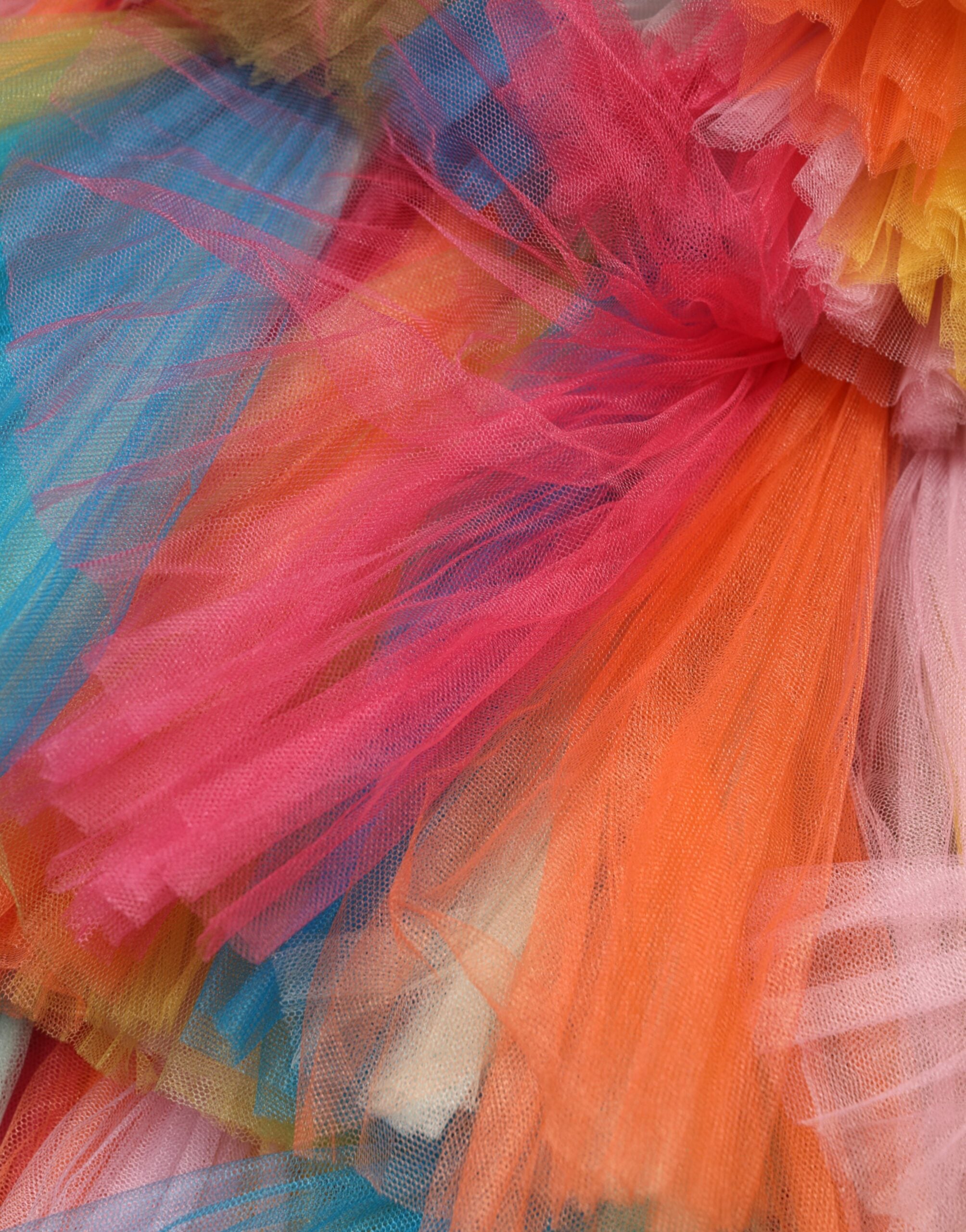 Discover the exquisite Dolce & Gabbana Multicolor Nylon Tiered Tulle Midi Dress, a masterpiece of Italian craftsmanship that embodies elegance and allure for any sophisticated occasion.