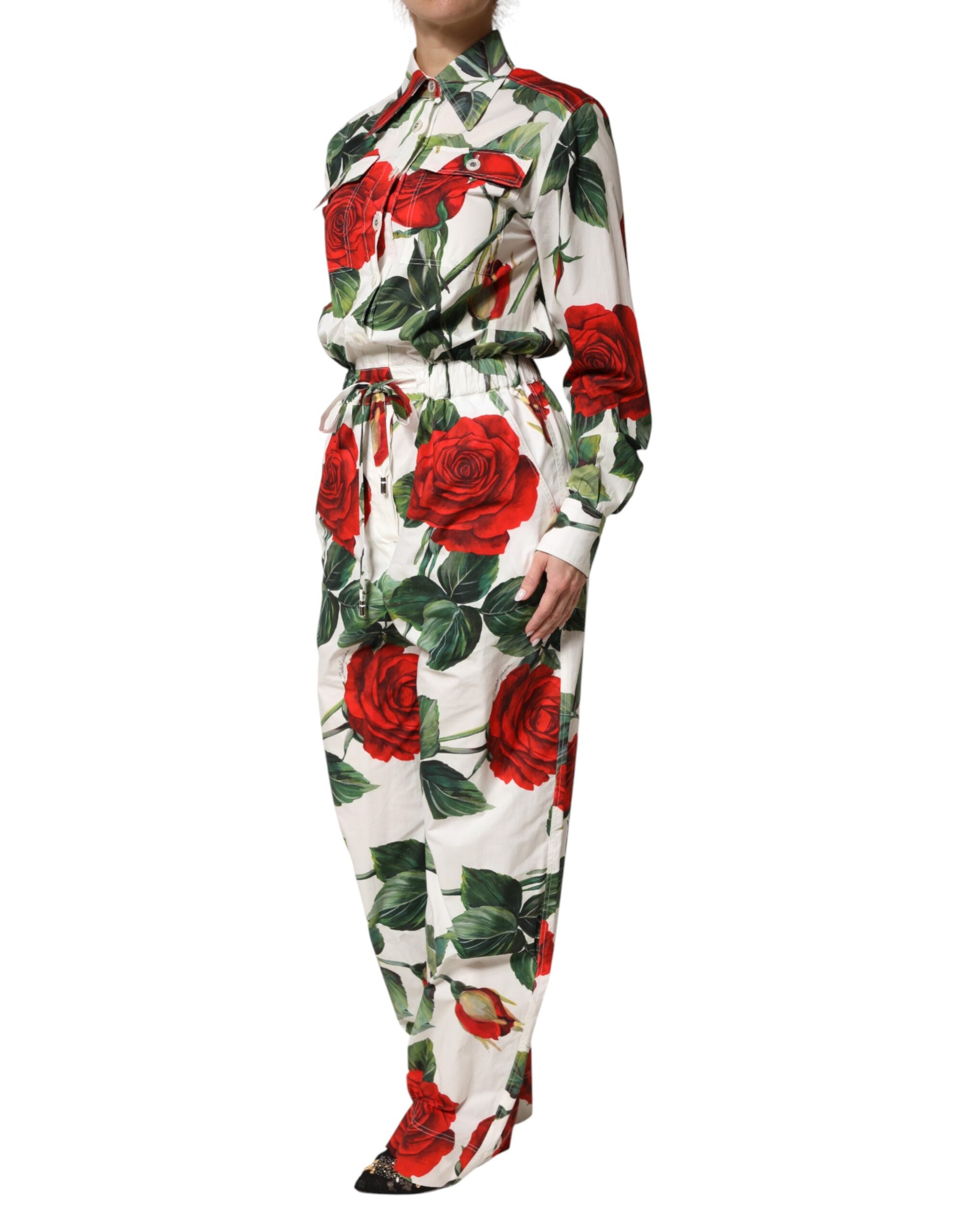Experience the allure of the Dolce & Gabbana White Floral Print Cotton Jumpsuit Dress, where exquisite craftsmanship meets timeless elegance for the discerning individual.