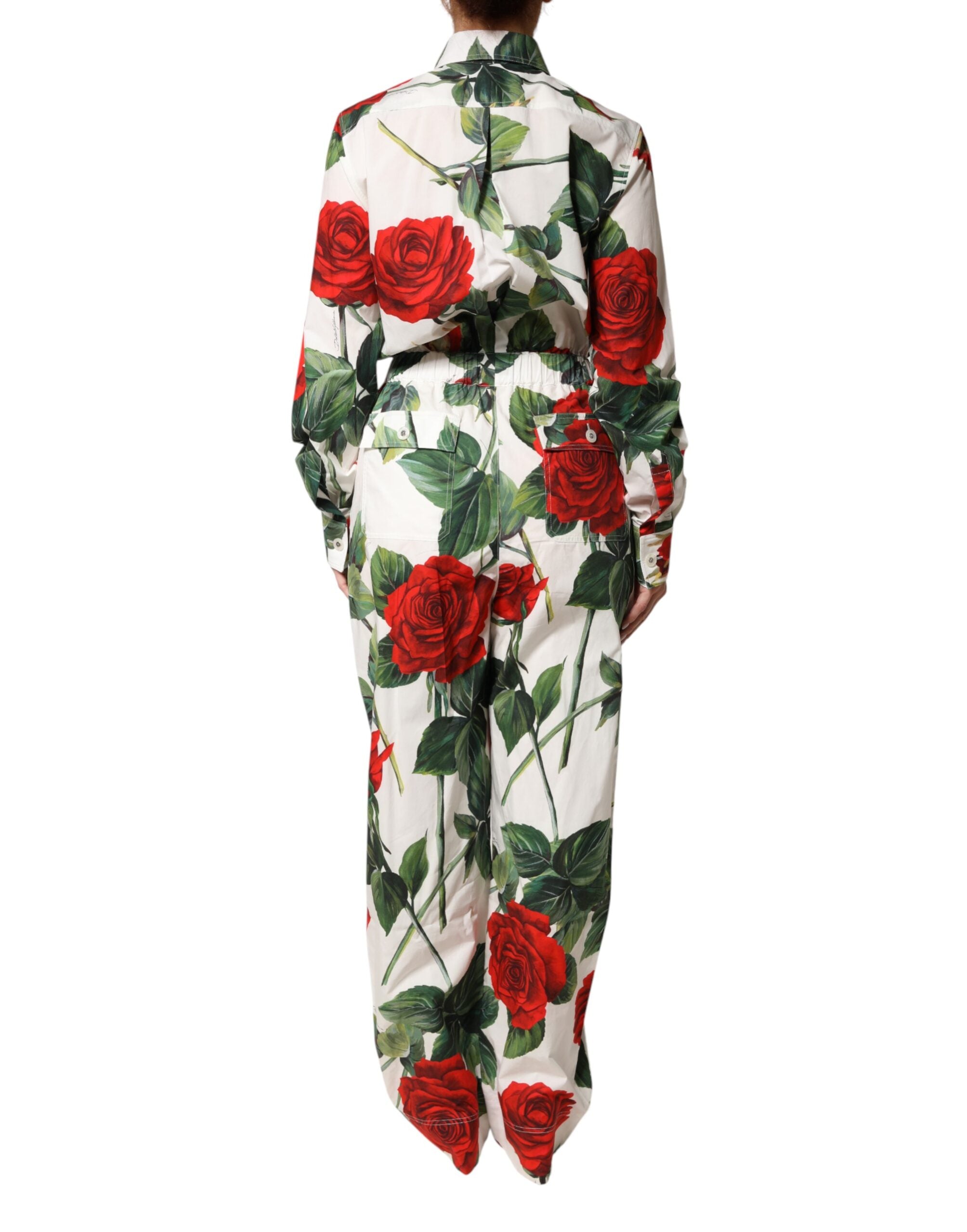 Elevate your wardrobe with the Dolce & Gabbana White Floral Print Cotton Jumpsuit Dress, a masterpiece of Italian craftsmanship that embodies timeless elegance and allure.