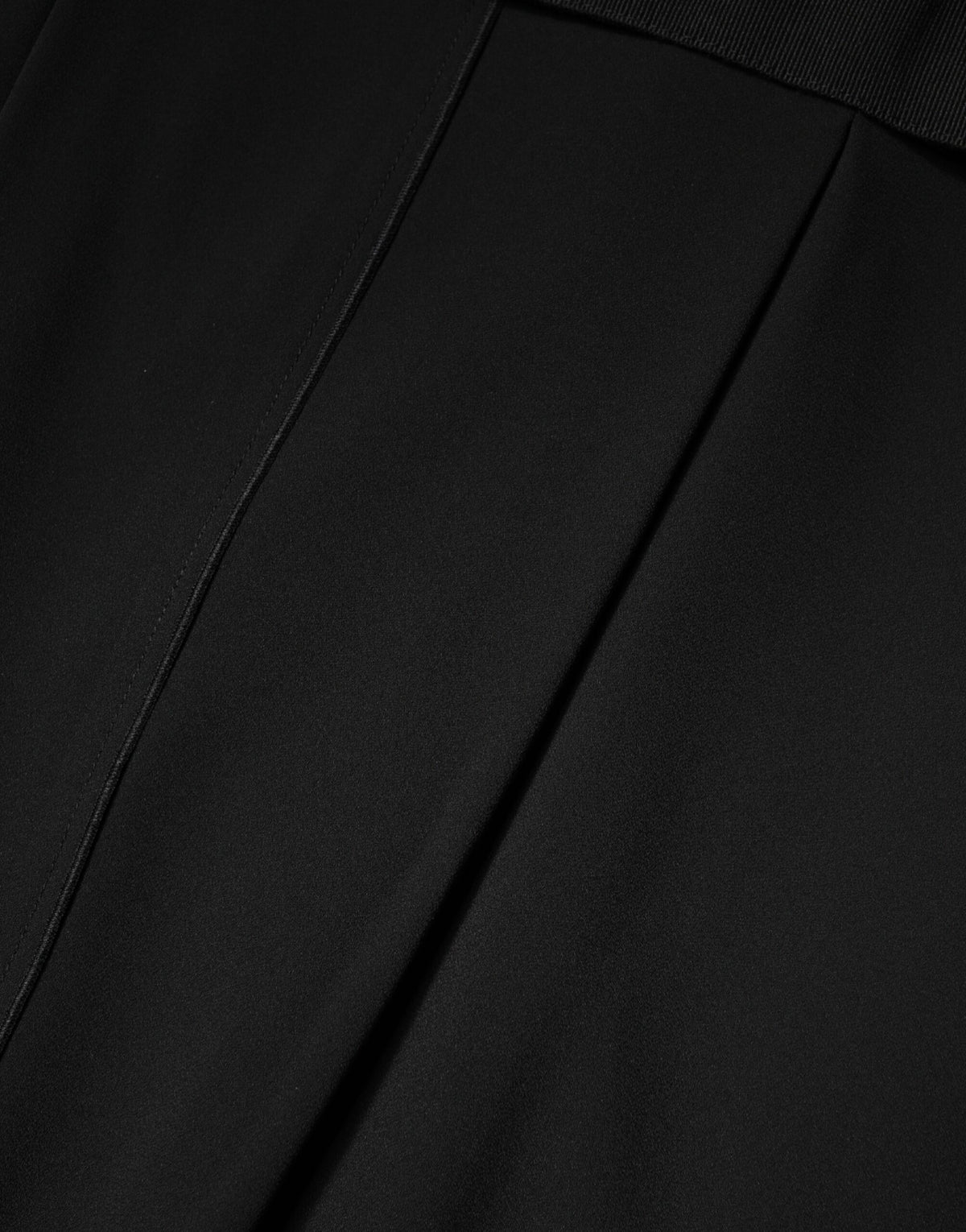 Indulge in the timeless elegance of the Dolce & Gabbana Black Sleeveless Sheath Dress, a masterpiece of luxurious craftsmanship that redefines sophistication and allure.