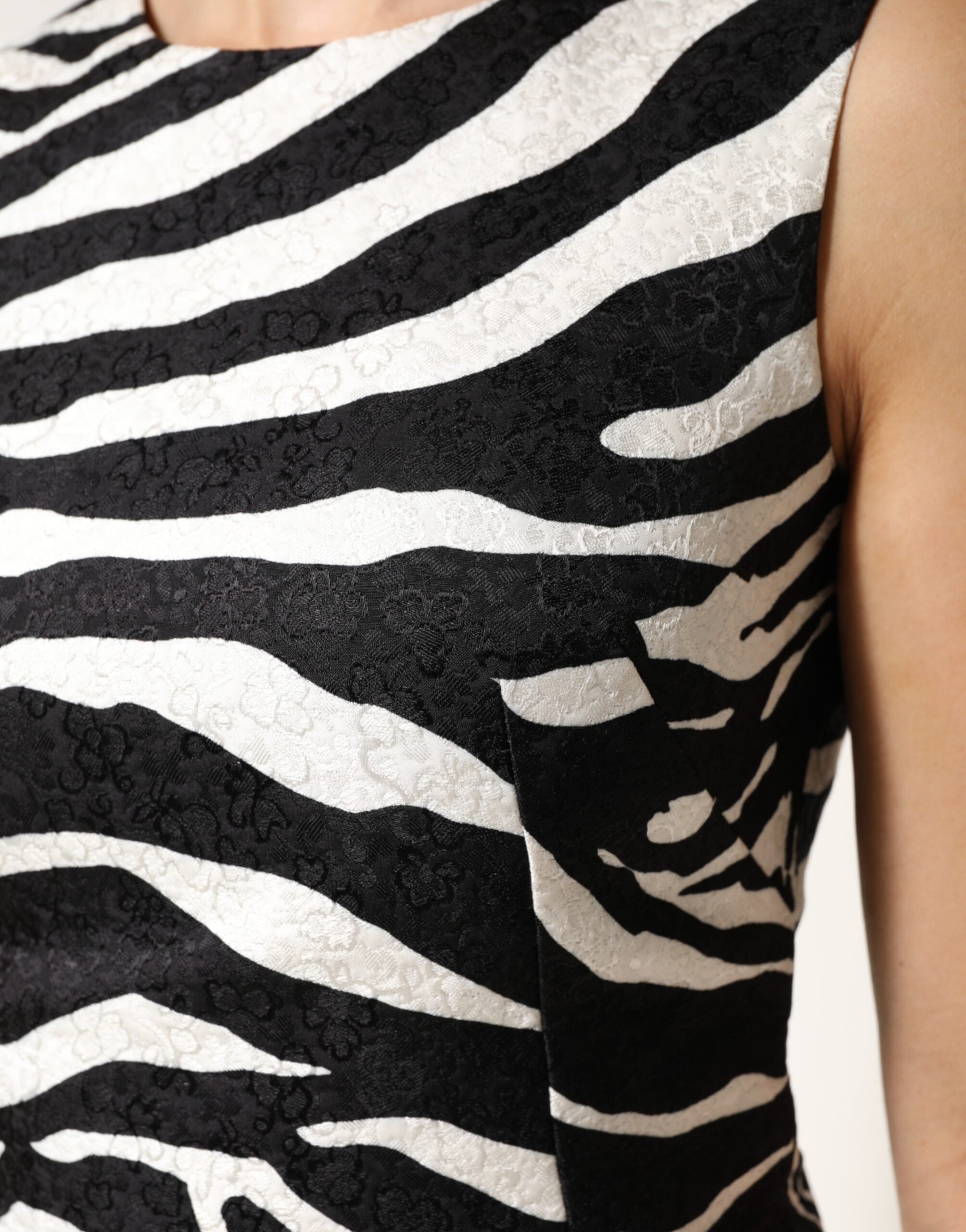 Discover the Dolce & Gabbana Black White Zebra Sleeveless A-line Dress, a masterpiece in luxurious cotton-viscose, embodying exquisite craftsmanship and timeless elegance.