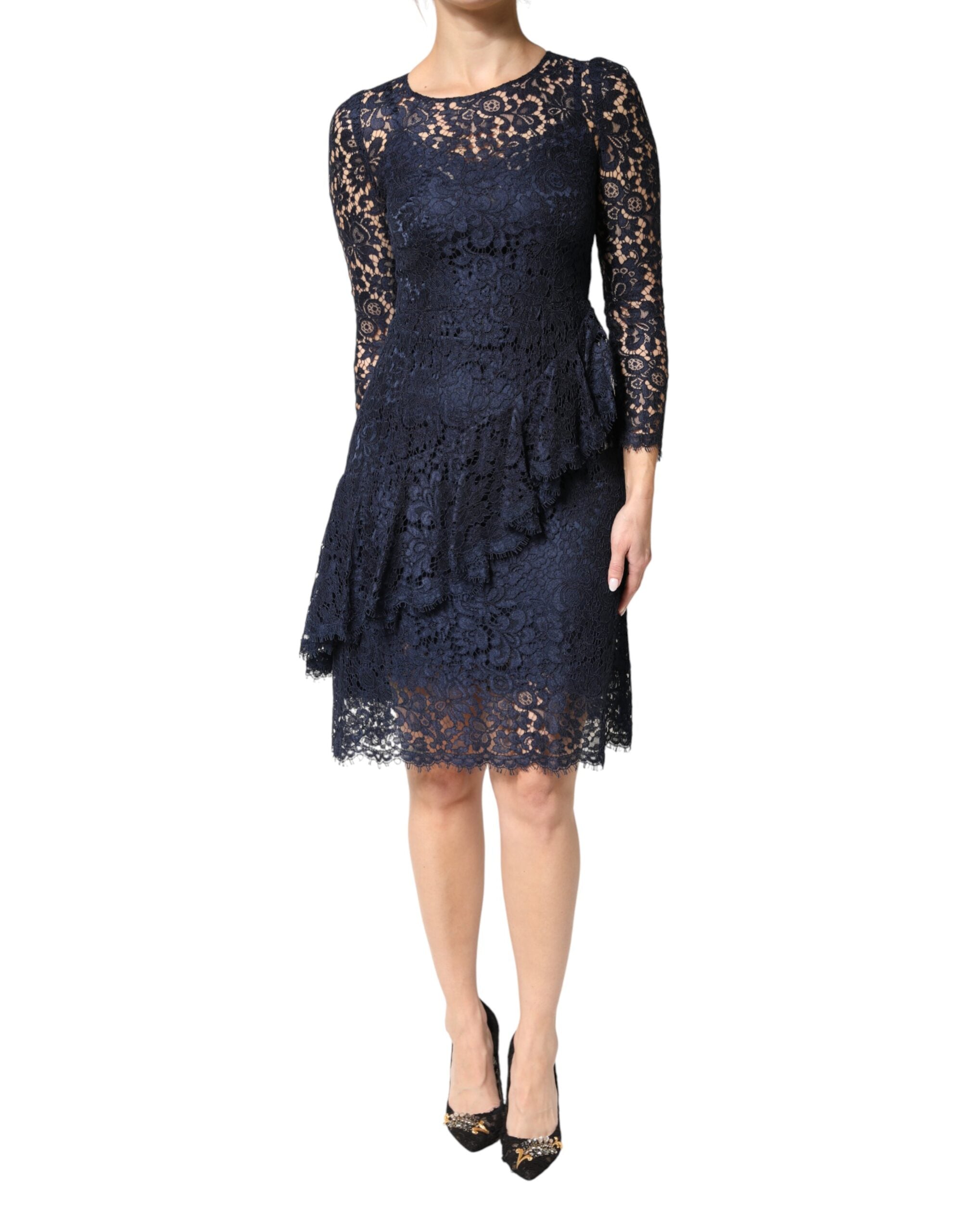 Elevate your elegance with the Dolce & Gabbana Blue Lace Ruffle A-line Knee Length Dress, a masterpiece of Italian craftsmanship and luxurious materials, perfect for unforgettable moments.