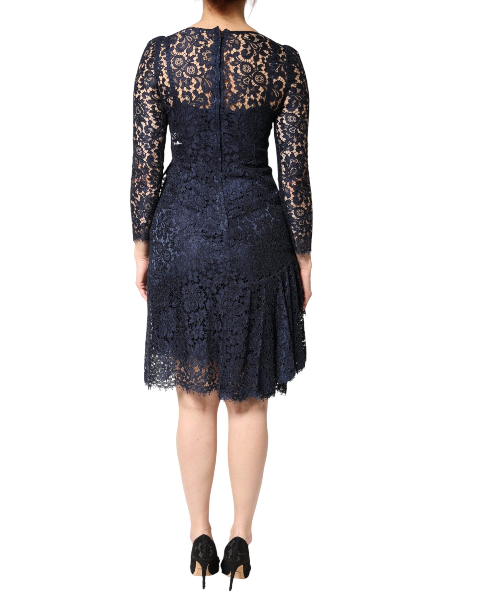 Experience the allure of the Dolce & Gabbana Blue Lace Ruffle A-line Knee Length Dress, a masterpiece of exquisite craftsmanship and luxurious materials, perfect for those who embody elegance and sophistication.