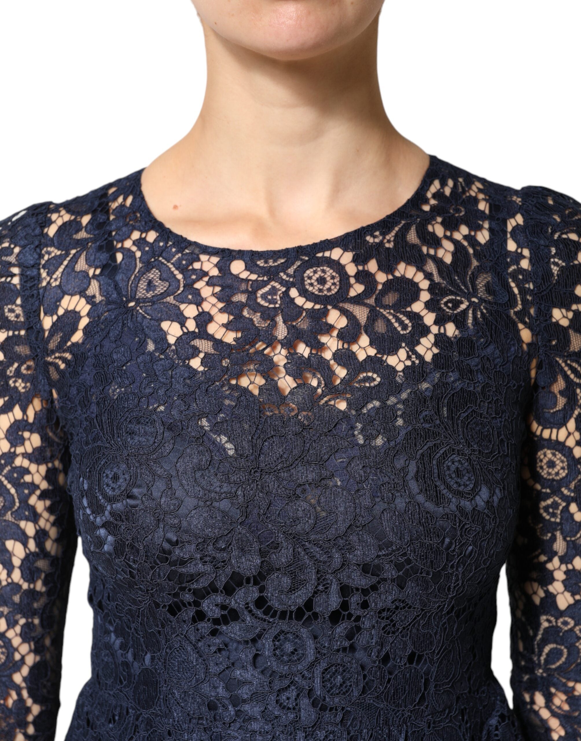 Experience the allure of the Dolce & Gabbana Blue Lace Ruffle A-line Knee Length Dress, a masterpiece of exquisite craftsmanship and luxurious materials, perfect for the discerning individual.