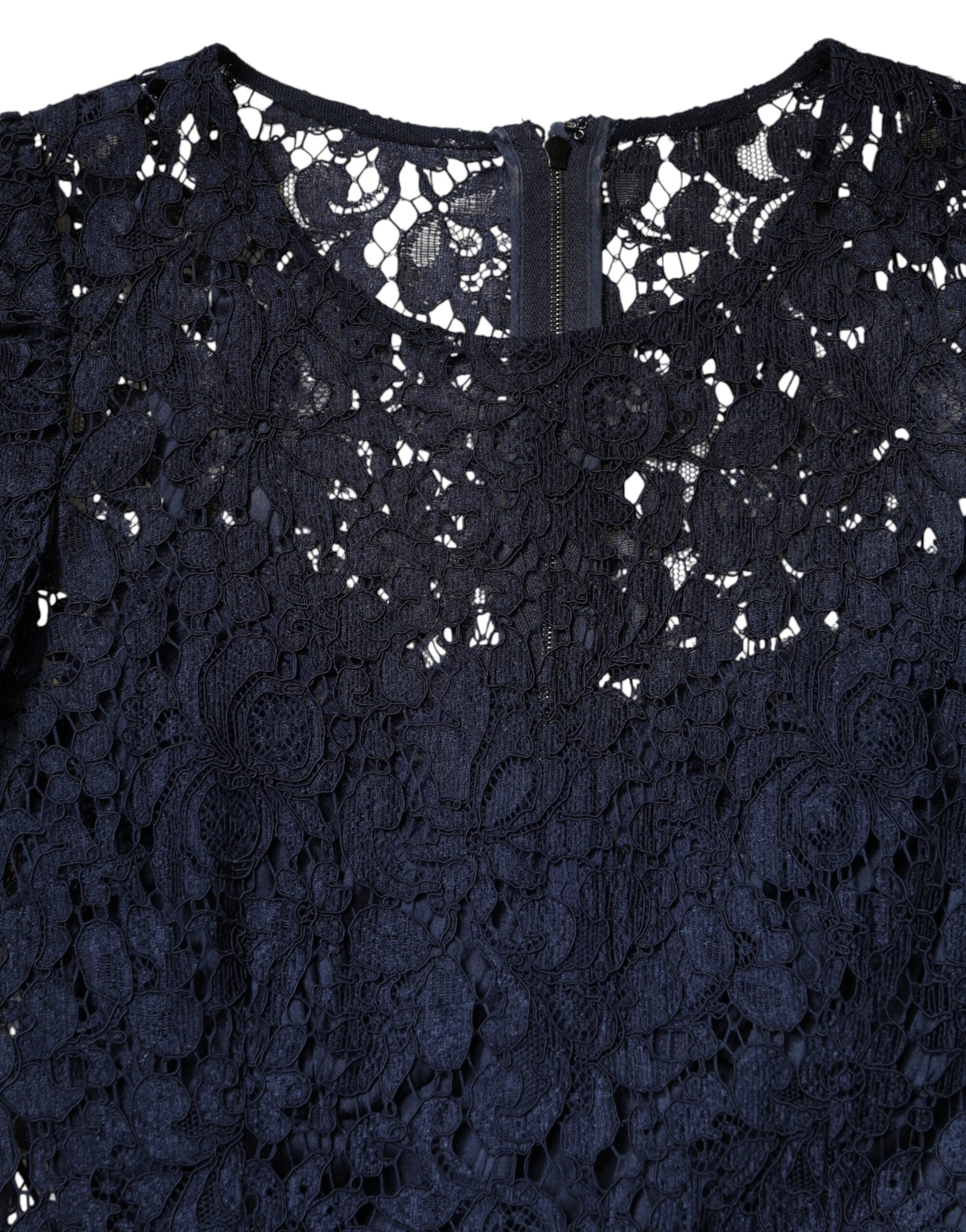 Experience the exquisite allure of the Dolce & Gabbana Blue Lace Ruffle A-line Knee Length Dress, a masterpiece of luxurious craftsmanship and timeless elegance, perfect for the discerning individual.