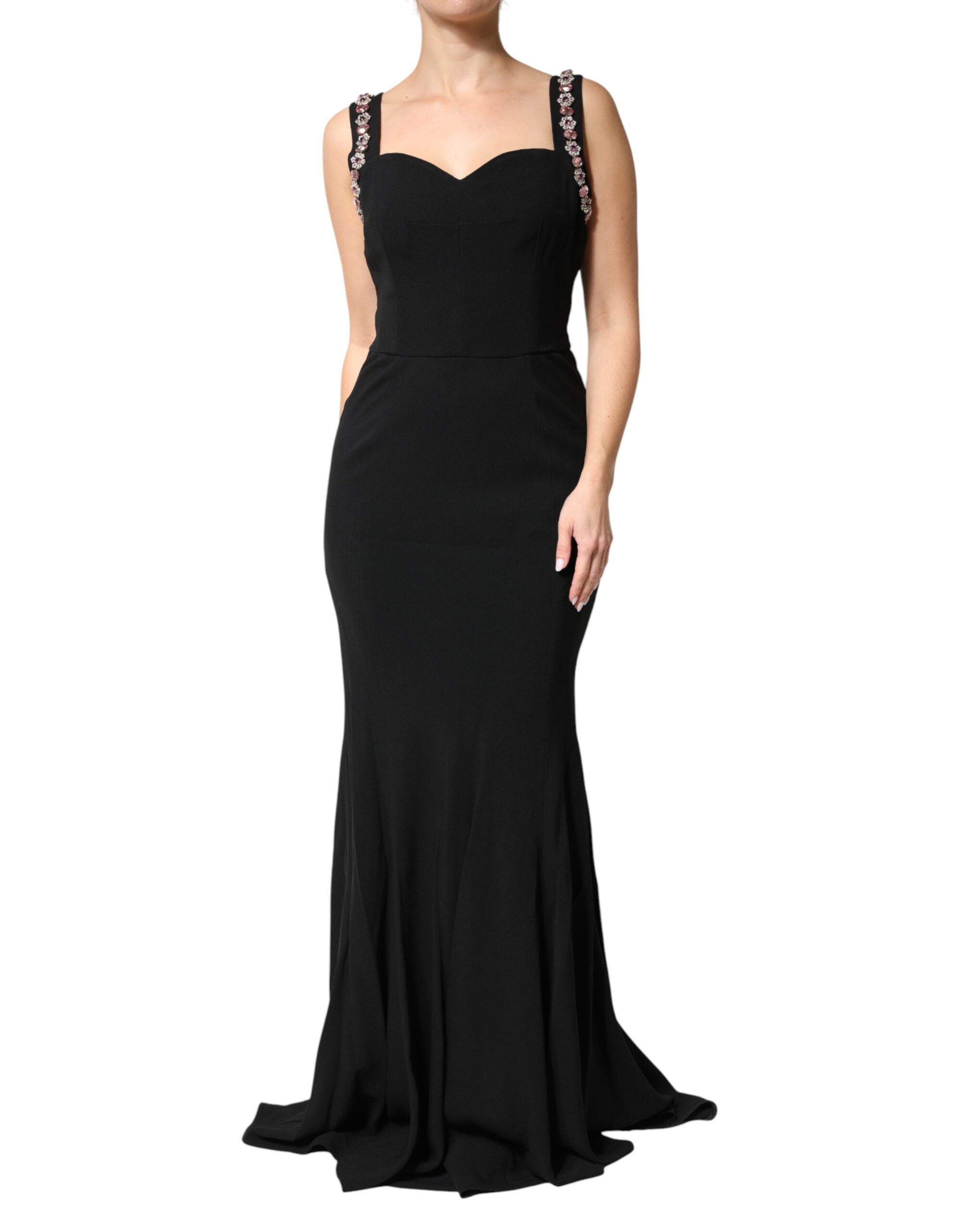 Indulge in the exquisite craftsmanship of the Dolce & Gabbana Black Embellished Bodycon Long Gown, where luxurious fabrics and alluring details elevate your elegance and confidence.