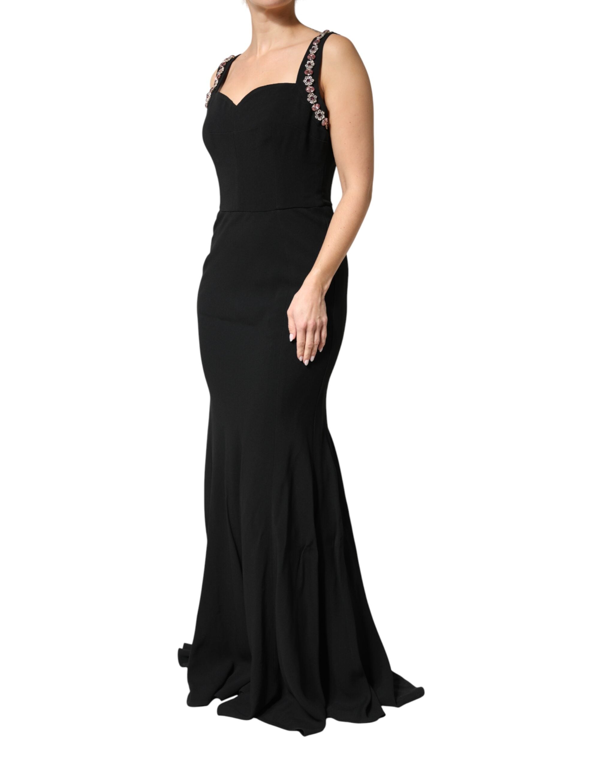 Experience the allure of the Dolce & Gabbana Black Embellished Bodycon Long Gown, where exquisite craftsmanship meets luxurious fabrics, celebrating timeless elegance and sophistication.