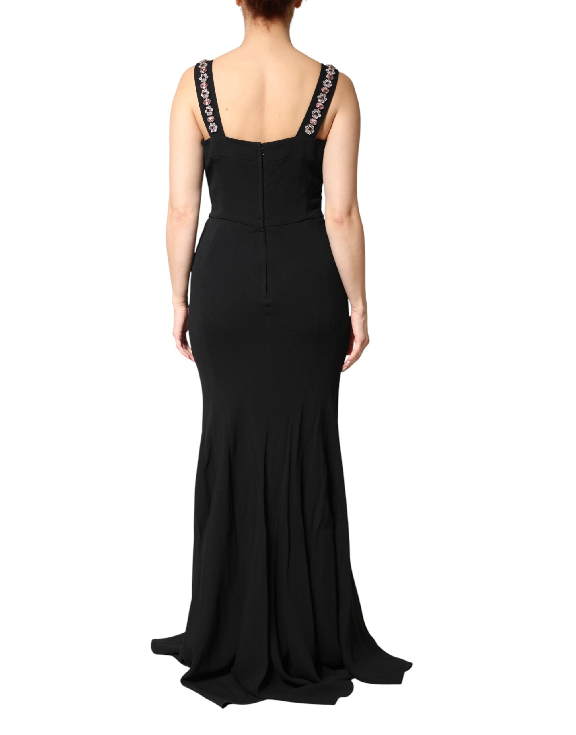 Indulge in the exquisite Dolce & Gabbana Black Embellished Bodycon Long Gown, a masterpiece of luxurious fabrics and Italian craftsmanship, designed for those who embody elegance and confidence.